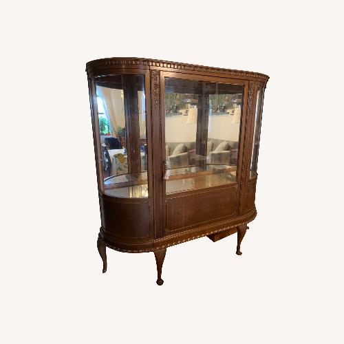 Used Curved Curio Armoire for sale on AptDeco