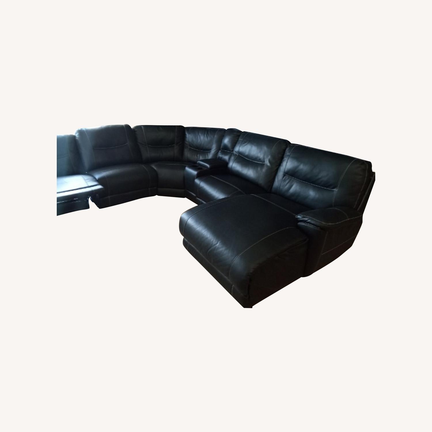 Black Leather Sectional with Recliner and Chaise - image-0
