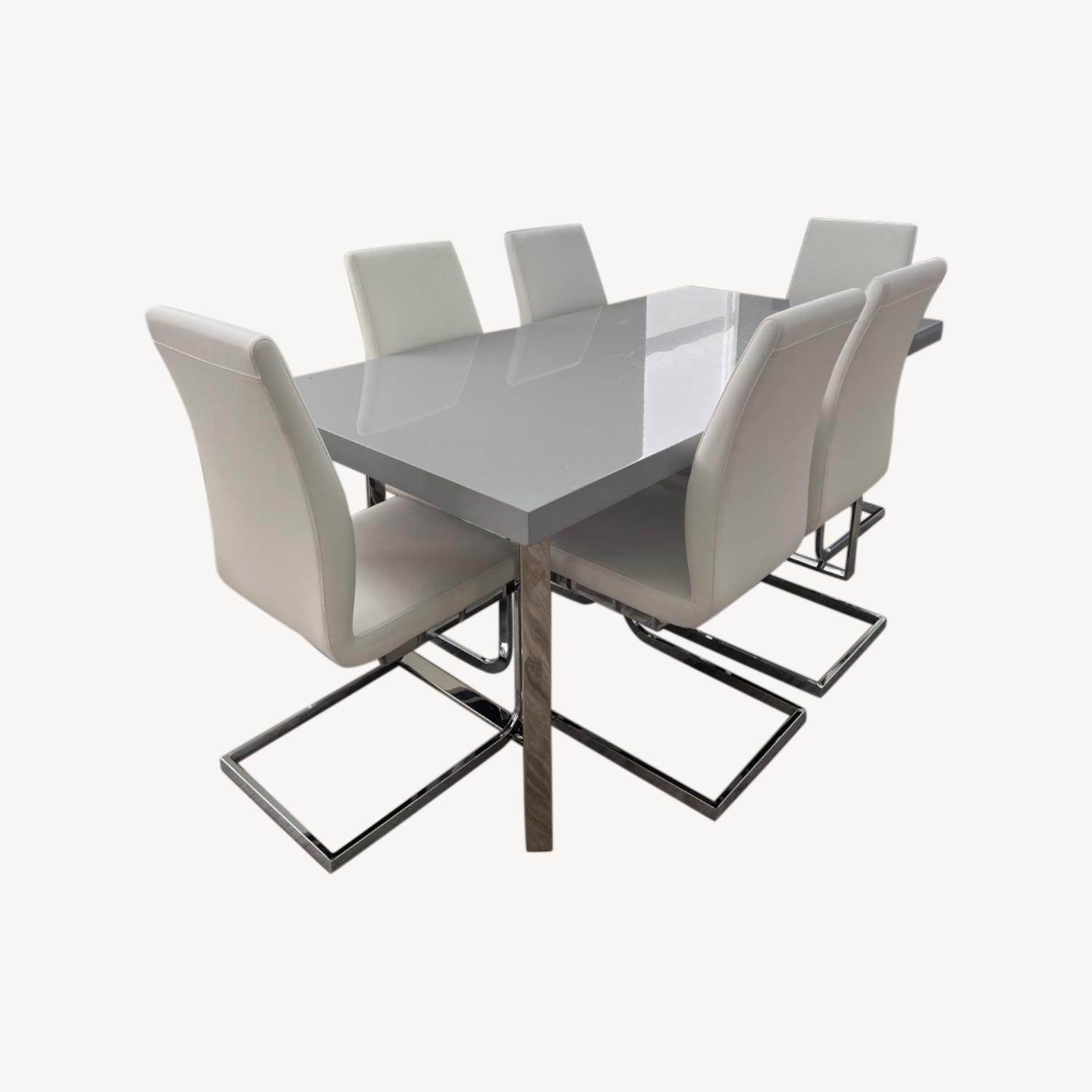 Modern Grey Dining Table With 6 White Chairs - image-0