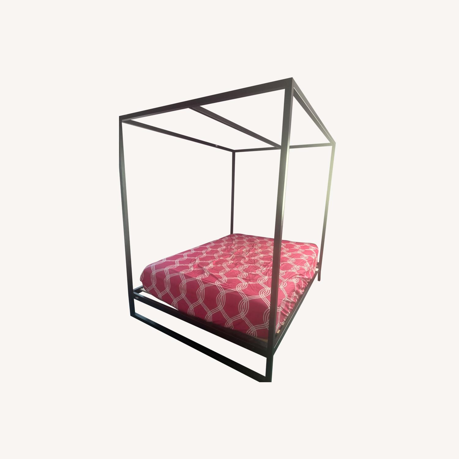 Pottery Barn Metal Canopy Queen Bed in Madison AptDeco