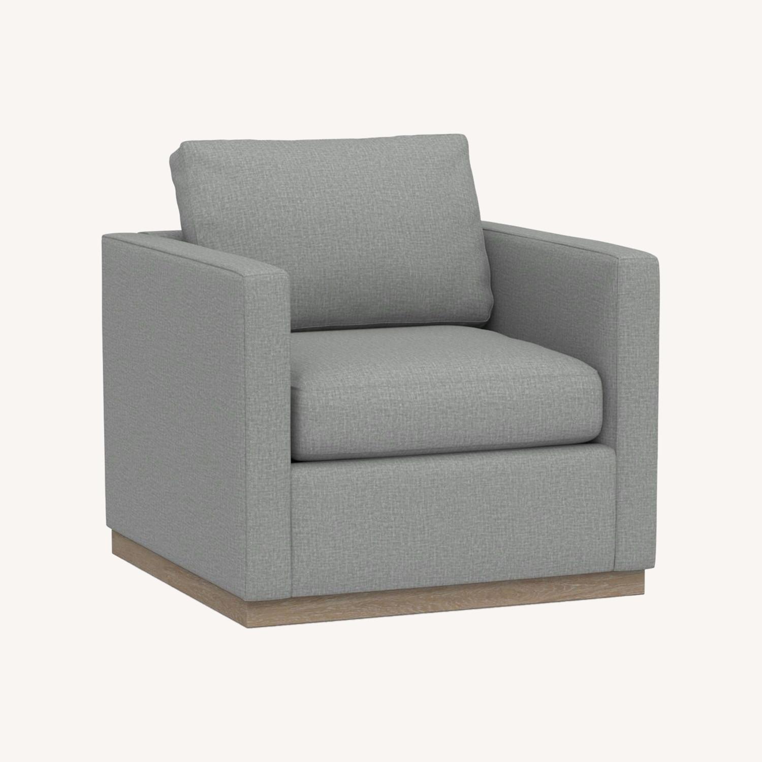 Pottery Barn Jake Upholstered Swivel Armchair AptDeco