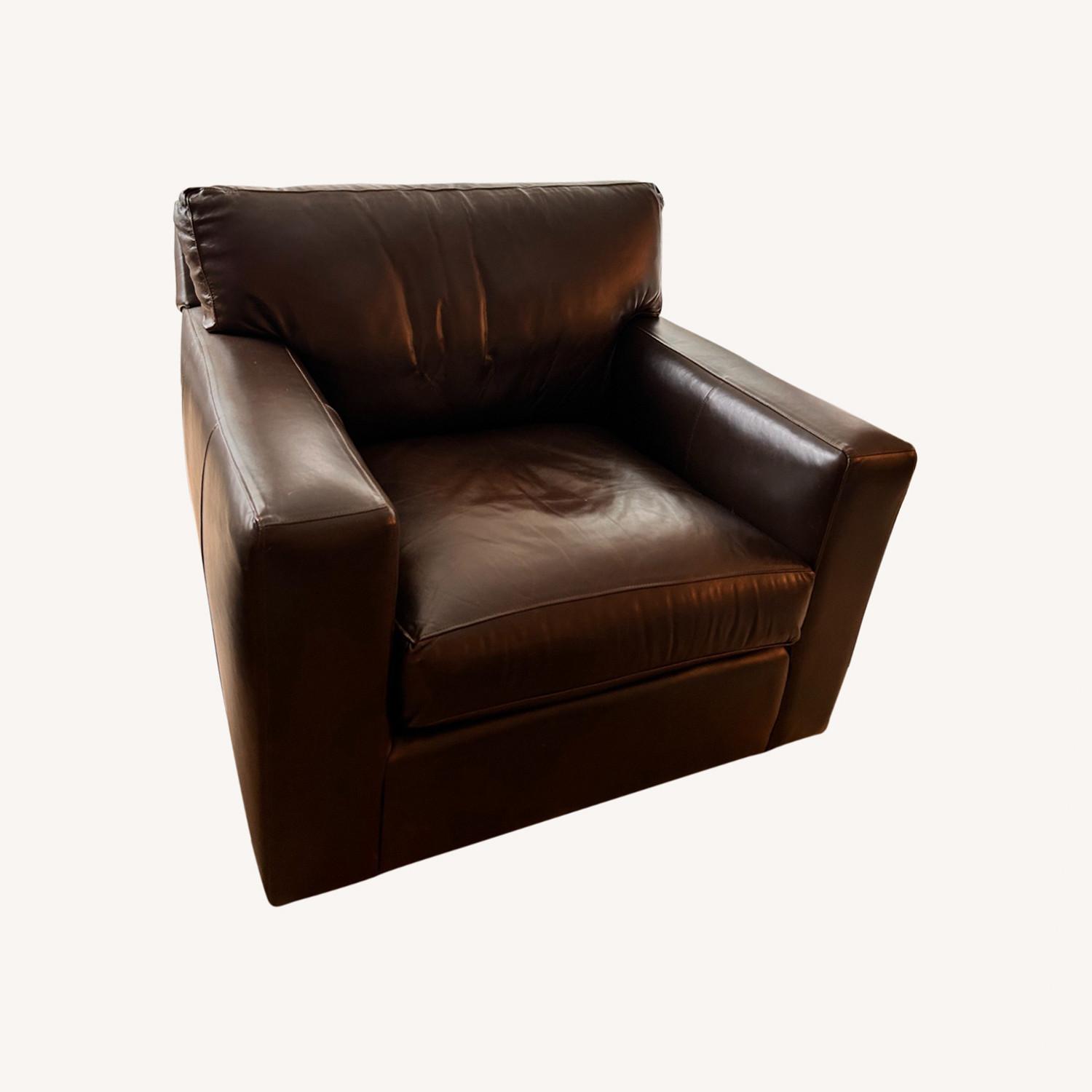Crate Barrel Dark Brown Leather Swivel chair AptDeco - Main Image