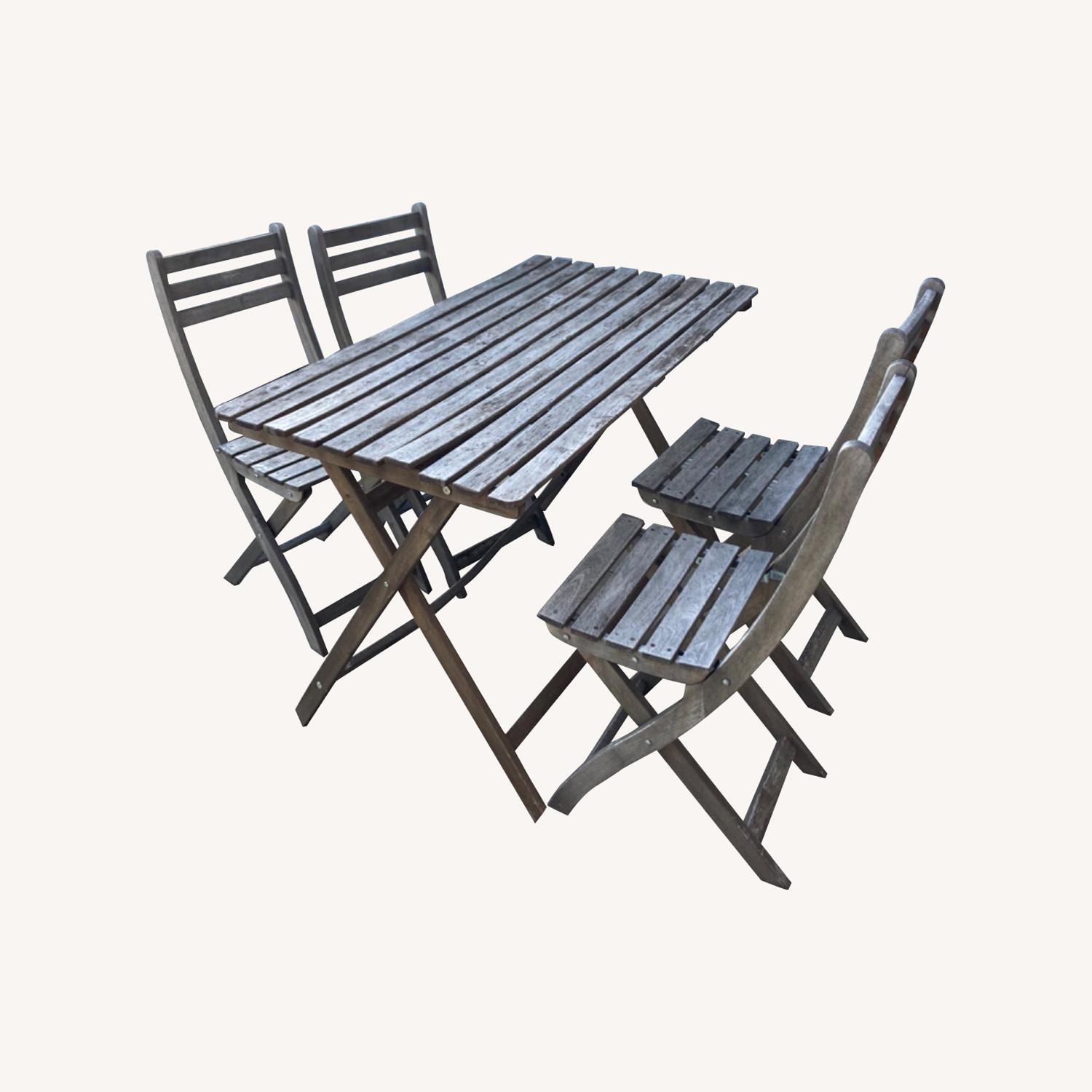 IKEA Outdoor Dining Table and Chairs AptDeco