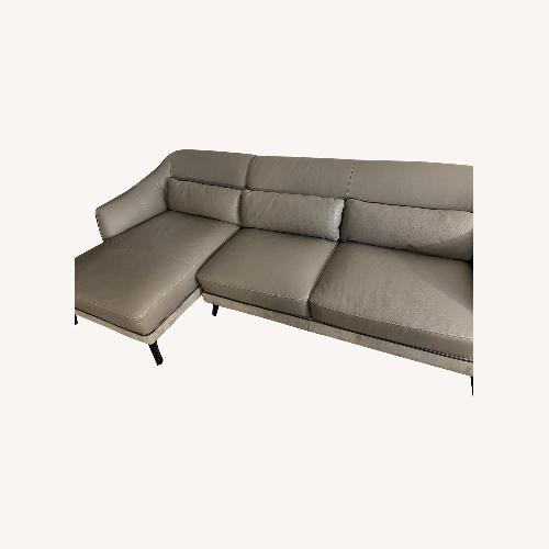 Used Gray Leather Sectional for sale on AptDeco