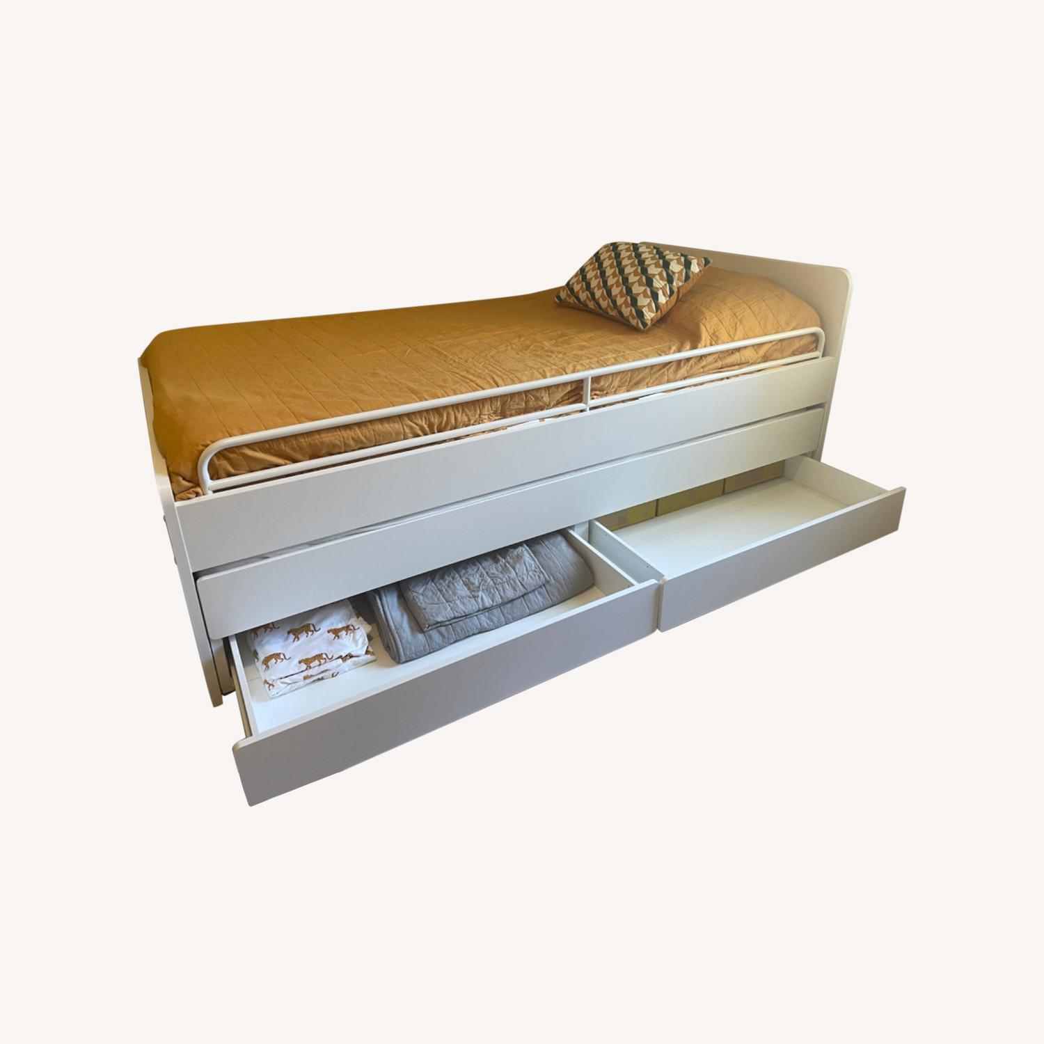 IKEA Twin Space Saving Bed- Pull-Out + Storage - image-0