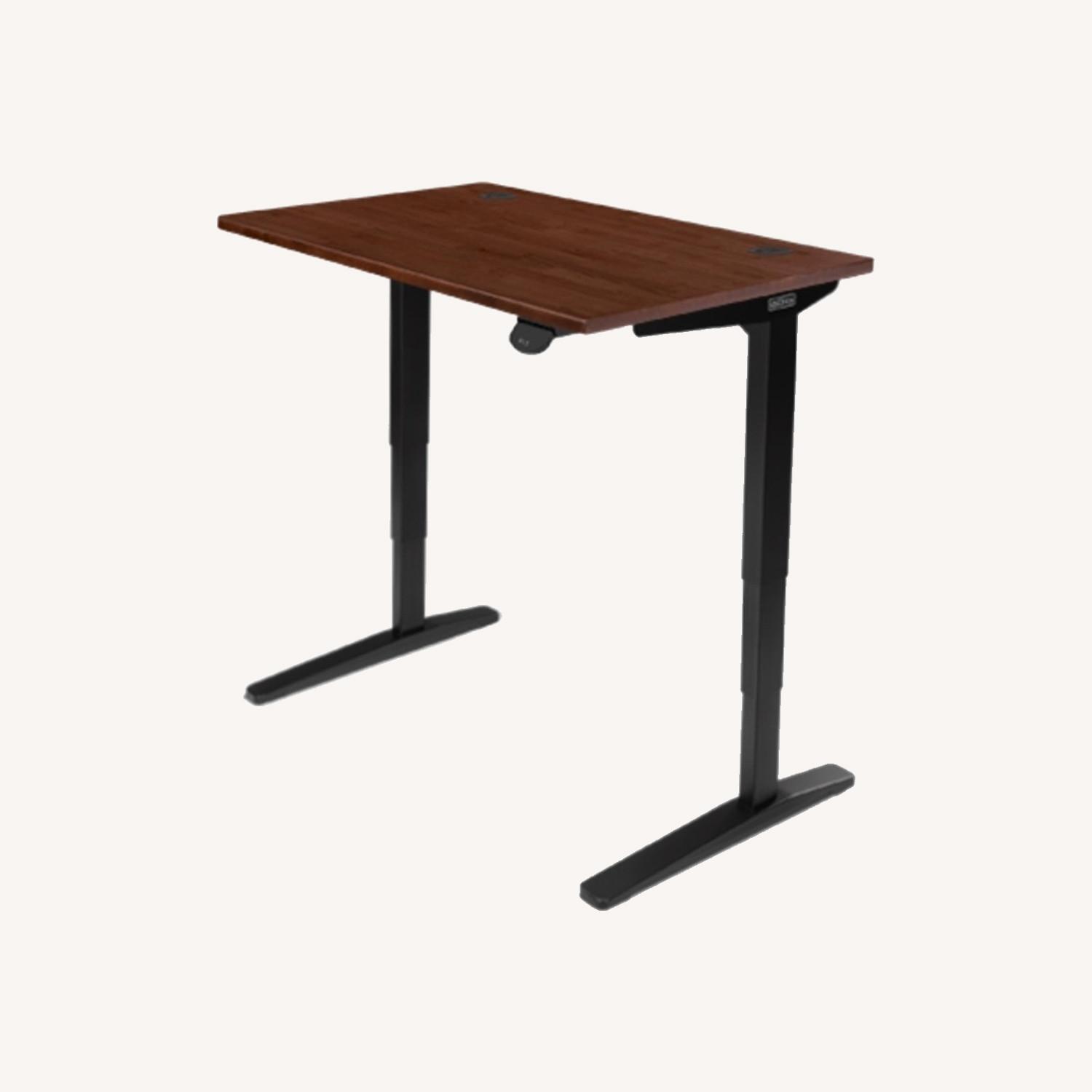 Uplift Solid Rubberwood Motorized Sit/Stand Desk AptDeco