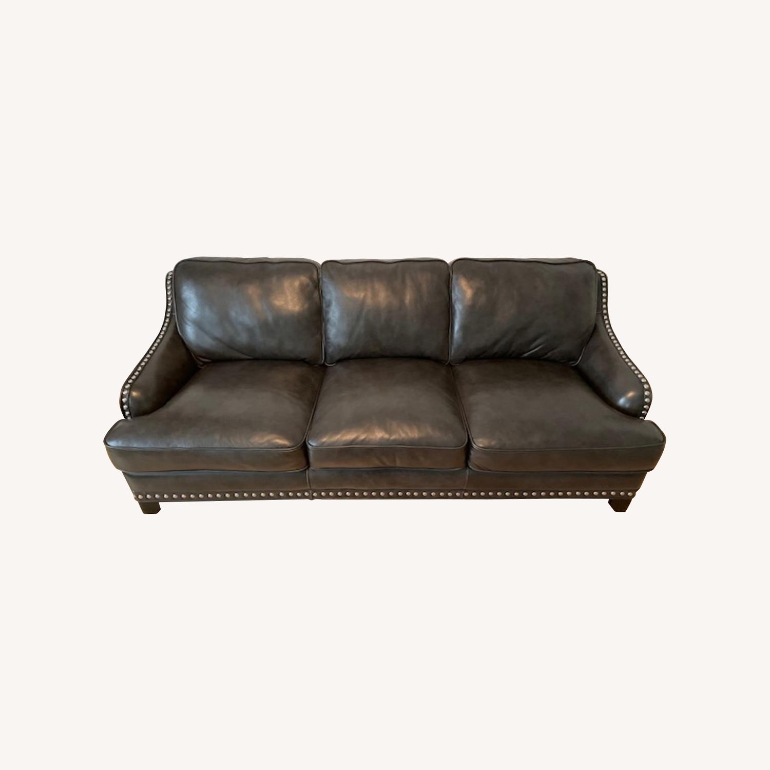 Raymour & Flanigan Leather Sofa in Black Silver Buttons AptDeco