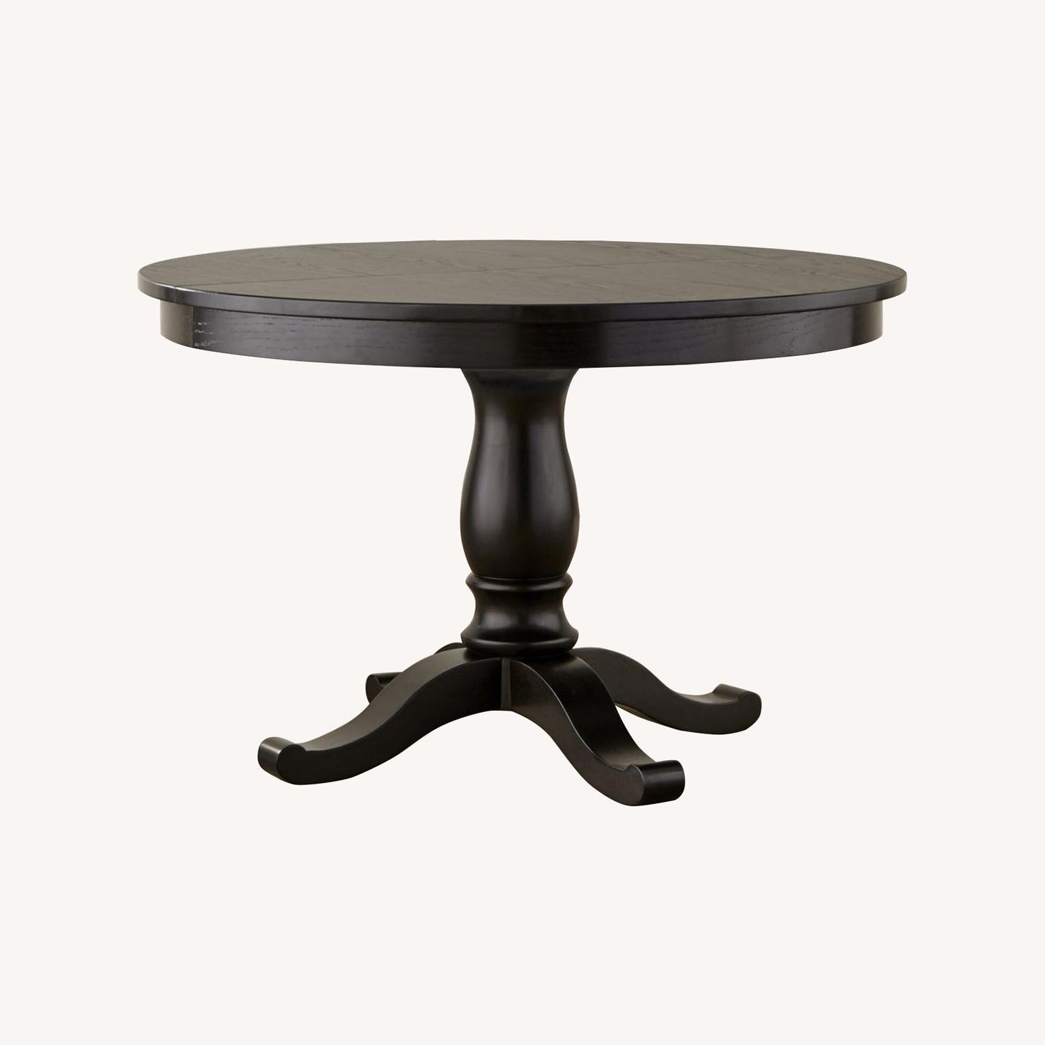 Crate & Barrel Black Pedestal Table With Leaf AptDeco