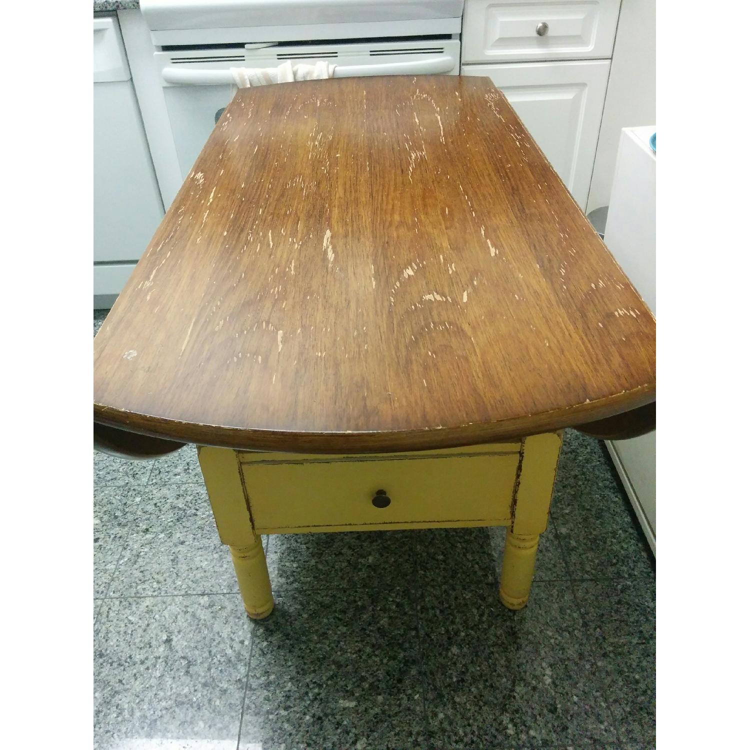 Crate & Barrel Basque Round Dining Table - AptDeco