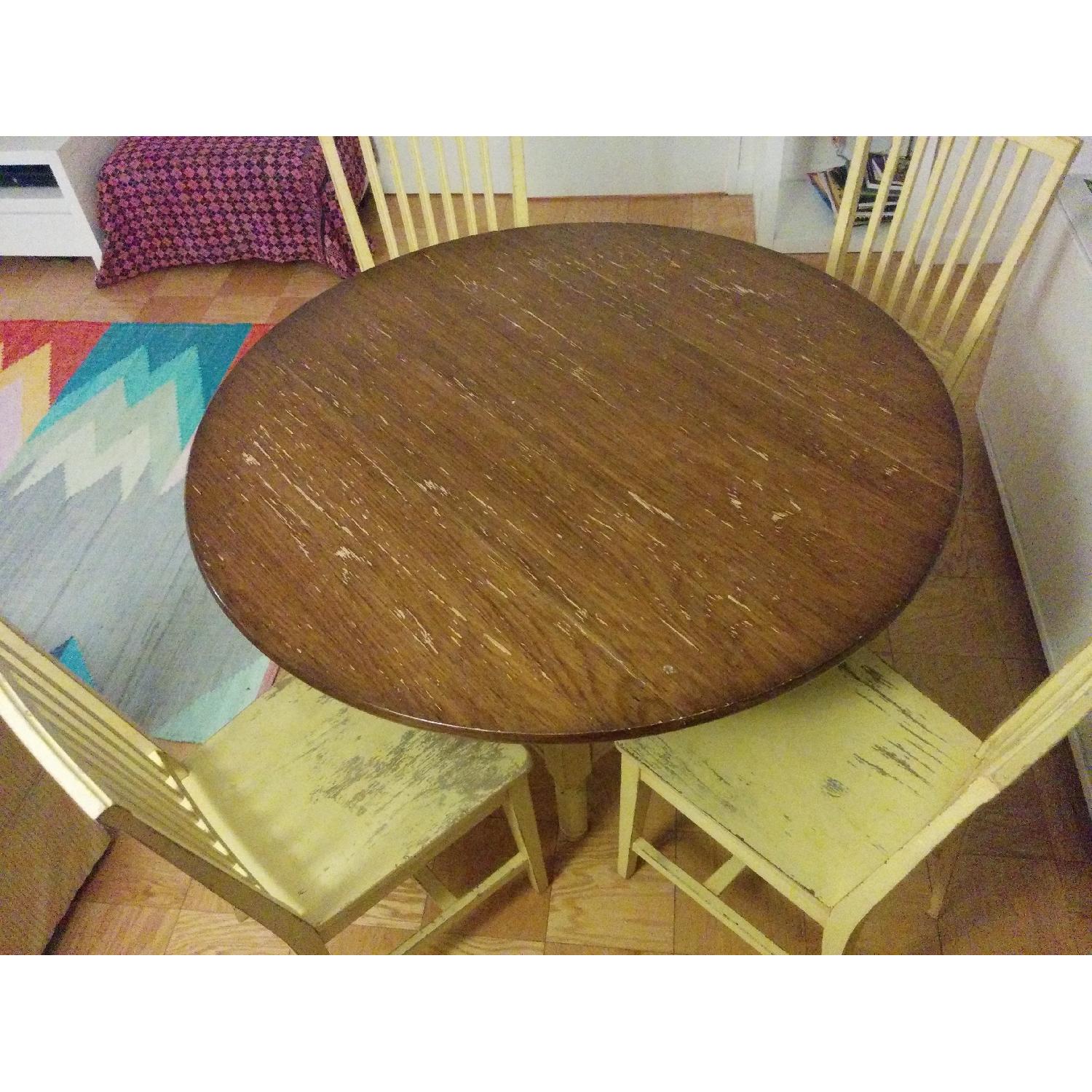 Crate & Barrel Basque Round Dining Table - AptDeco