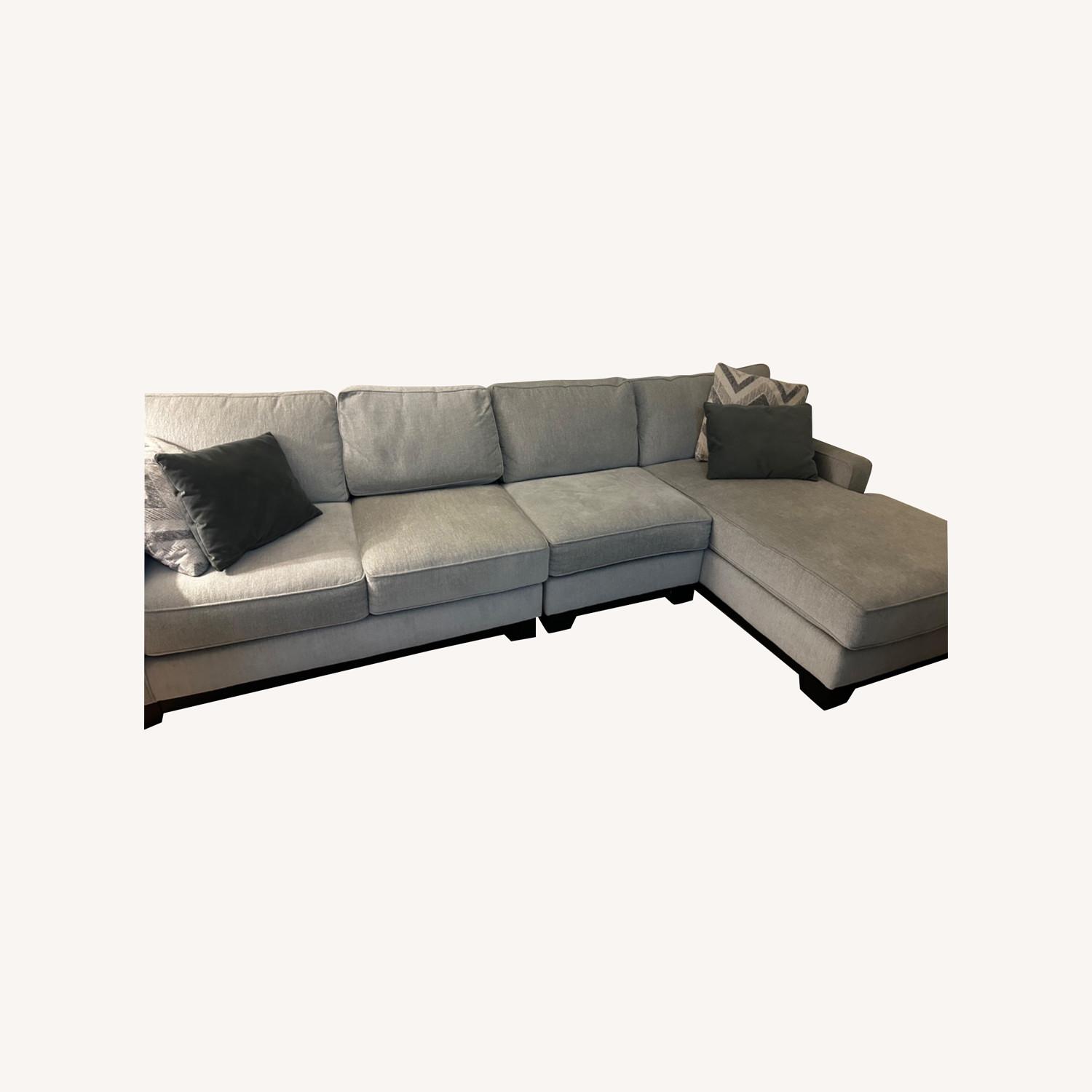 Raymour & Flanigan Modern Sectional Sofa with Chaise - AptDeco