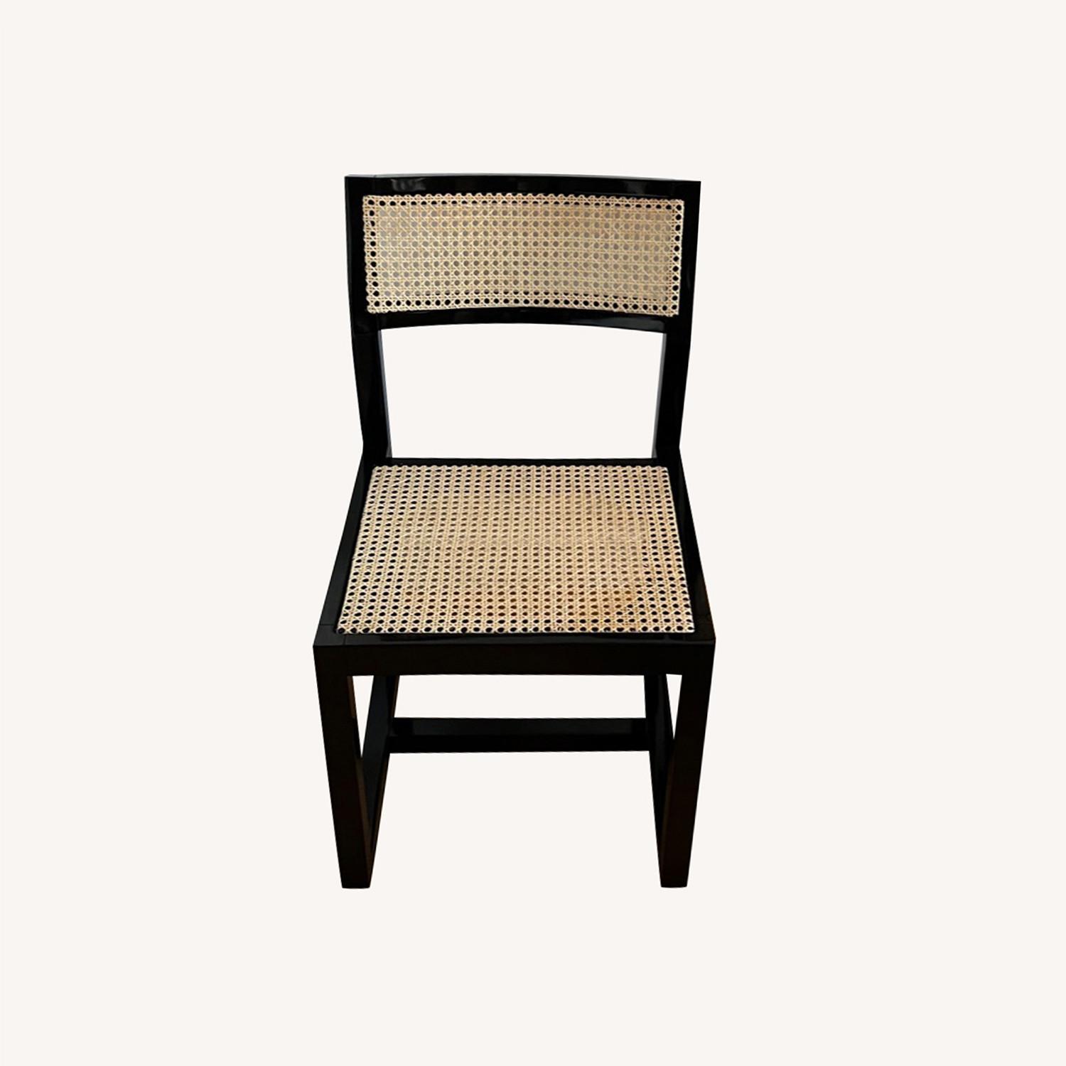 CB2 Makan Black Wood And Cane Dining Chairs AptDeco