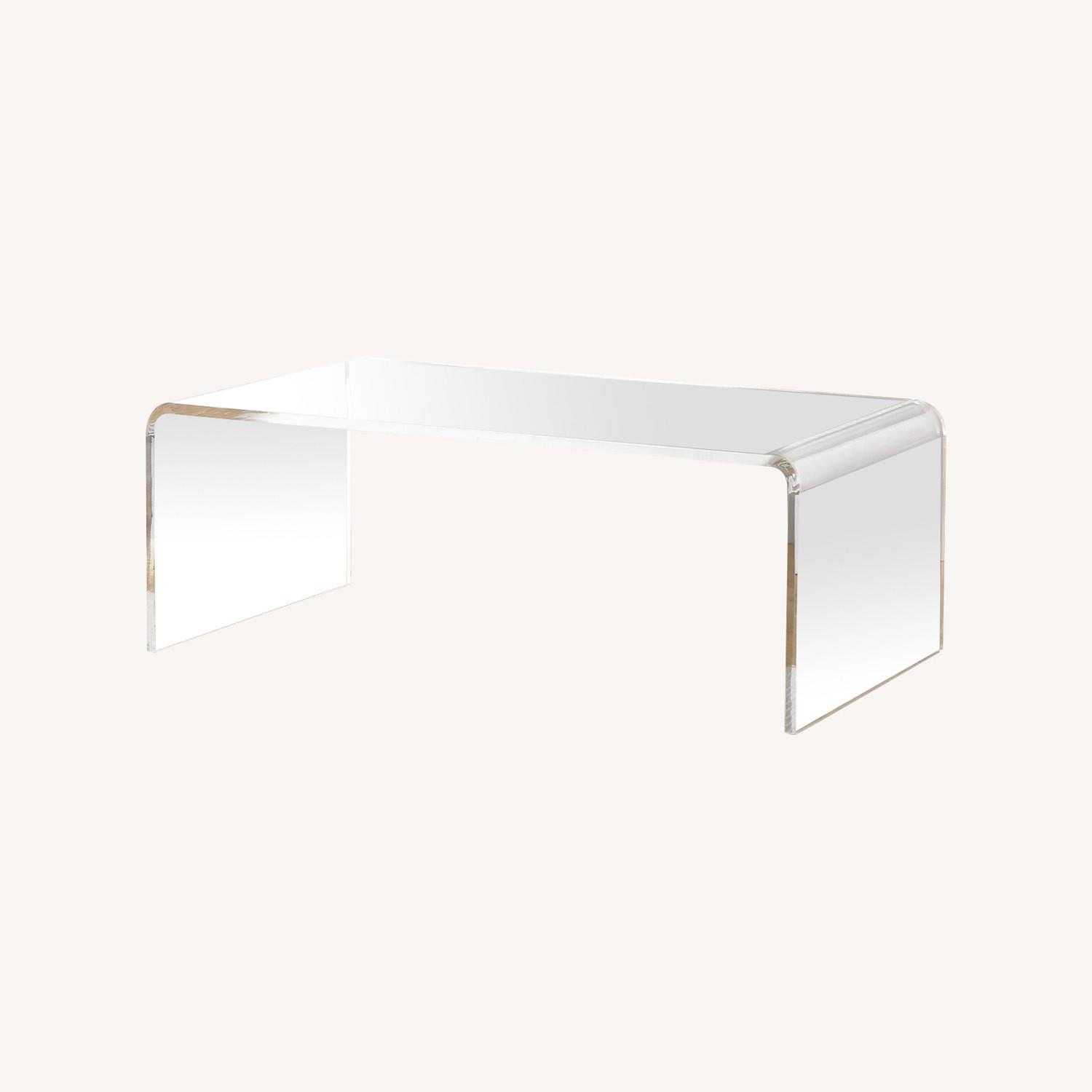 CB2 Acrylic Peekaboo Coffee Table AptDeco