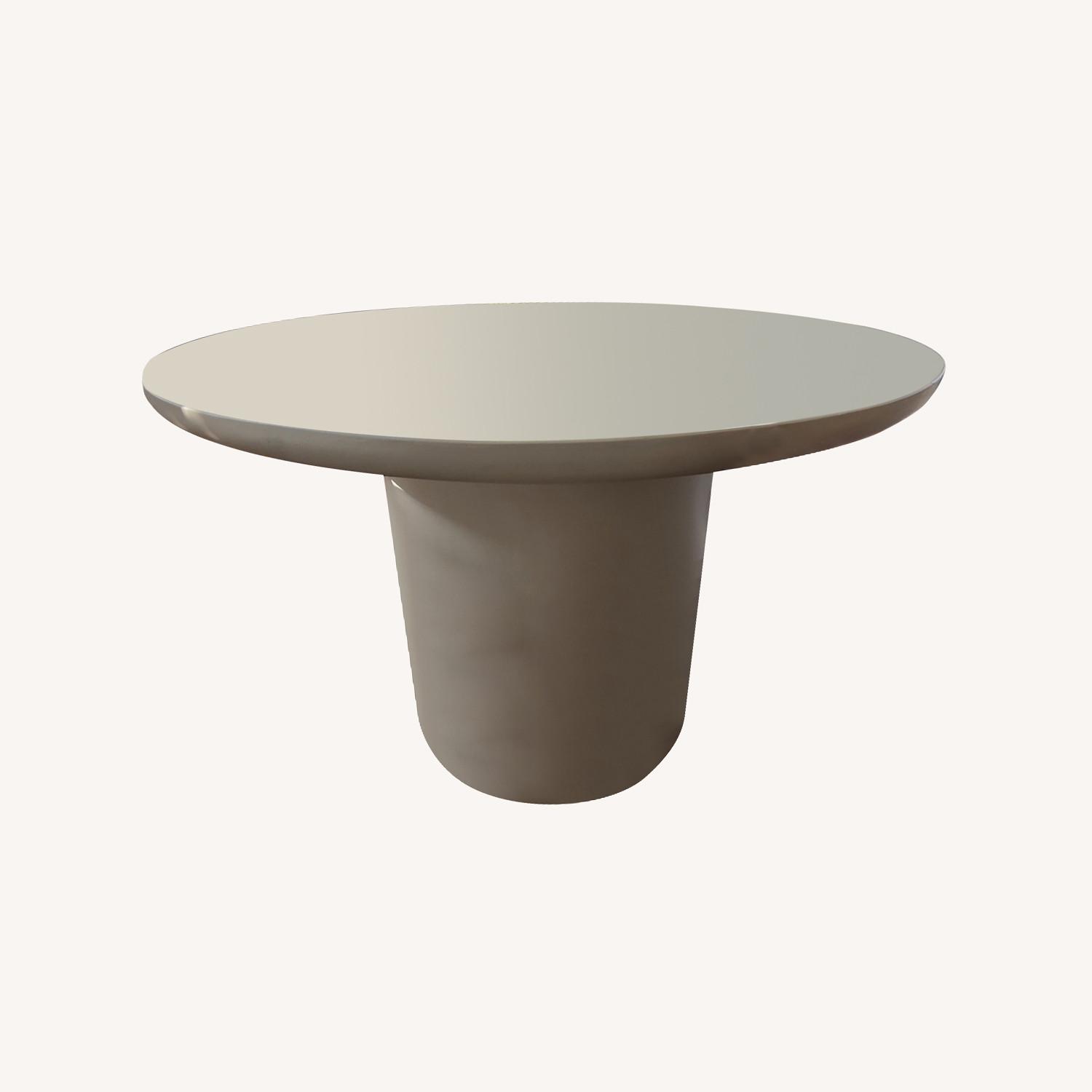 CB2 Lola Round Concrete Dining Table AptDeco