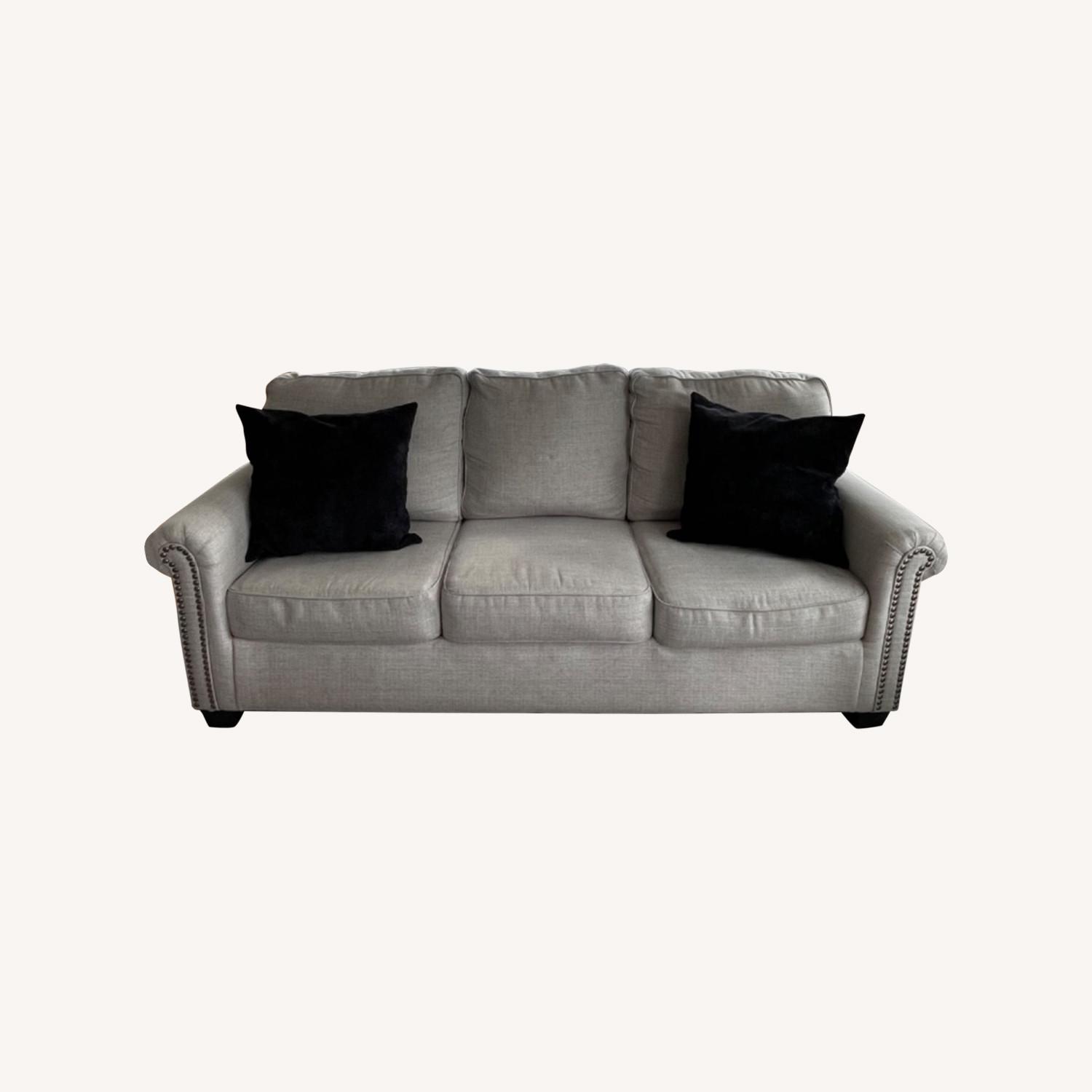 Ashley Grey Sofa and Pillows - image-0