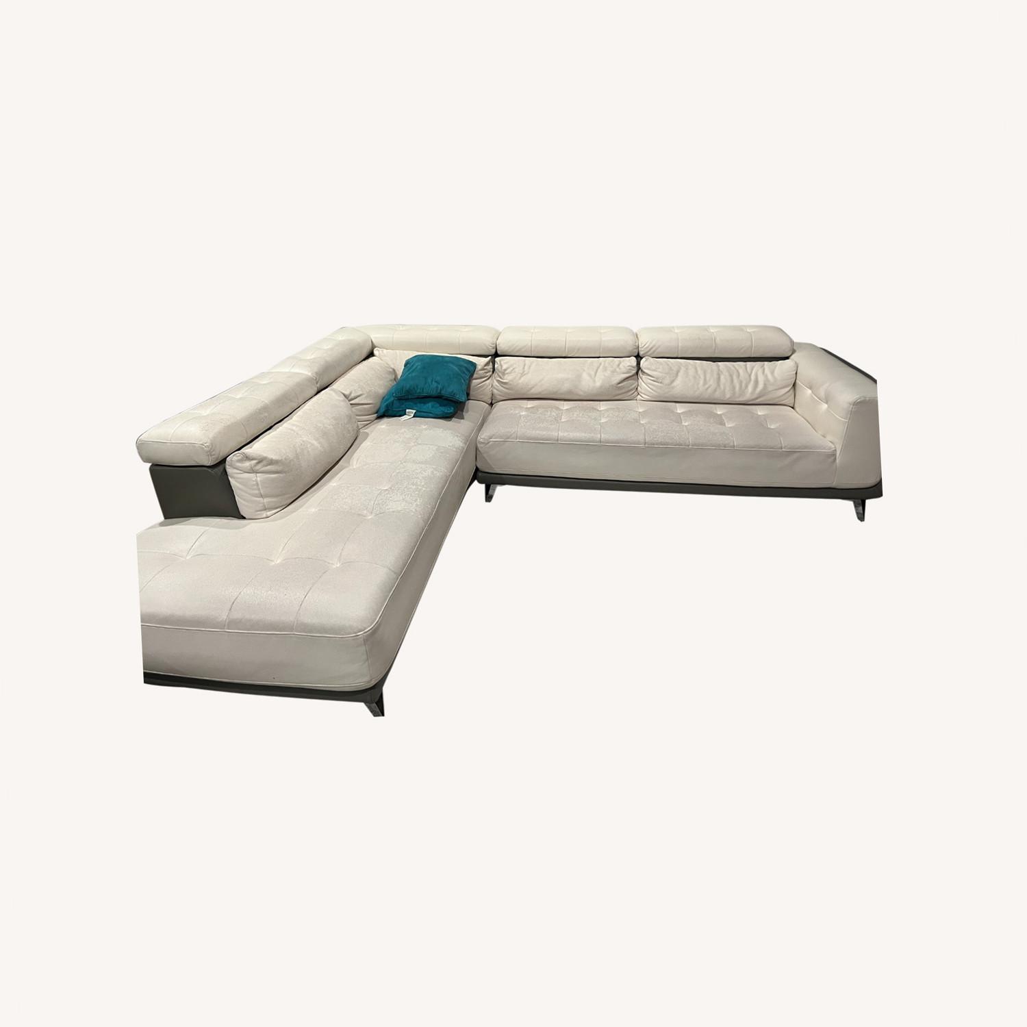 Rooms To Go White Faux Leather Sectional - image-0