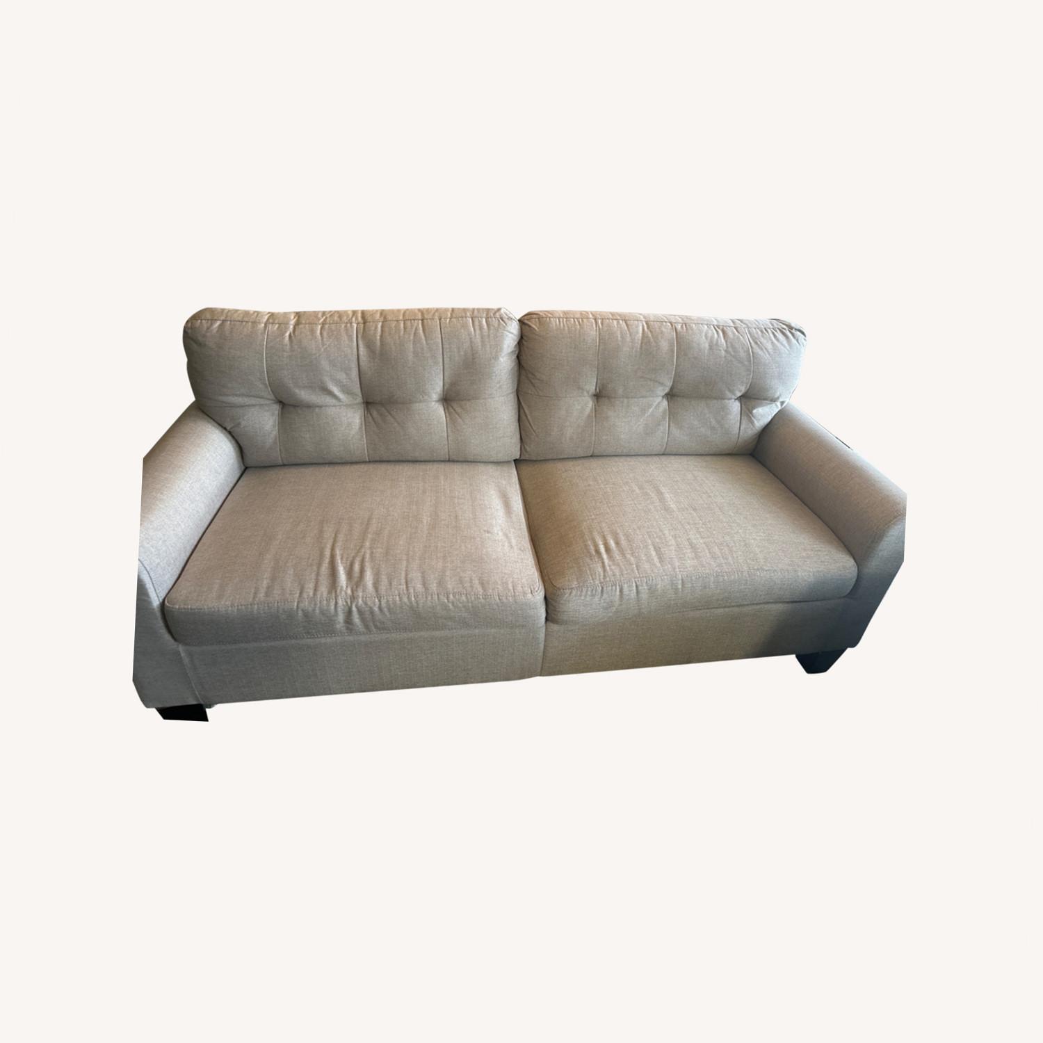 Living Spaces Light Grey Couch - image-0