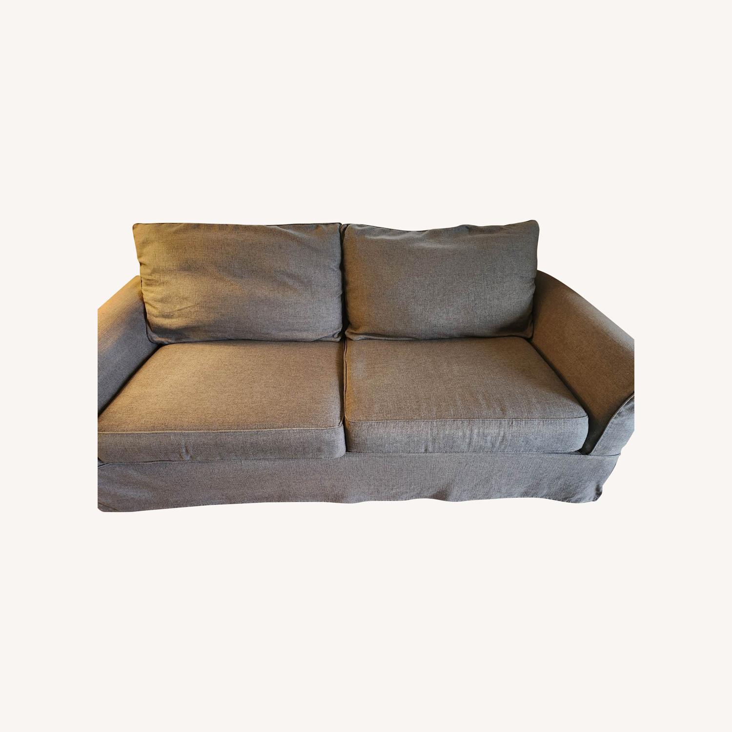Pottery Barn Grey Sleeper Sofa + Extra Slipcover AptDeco