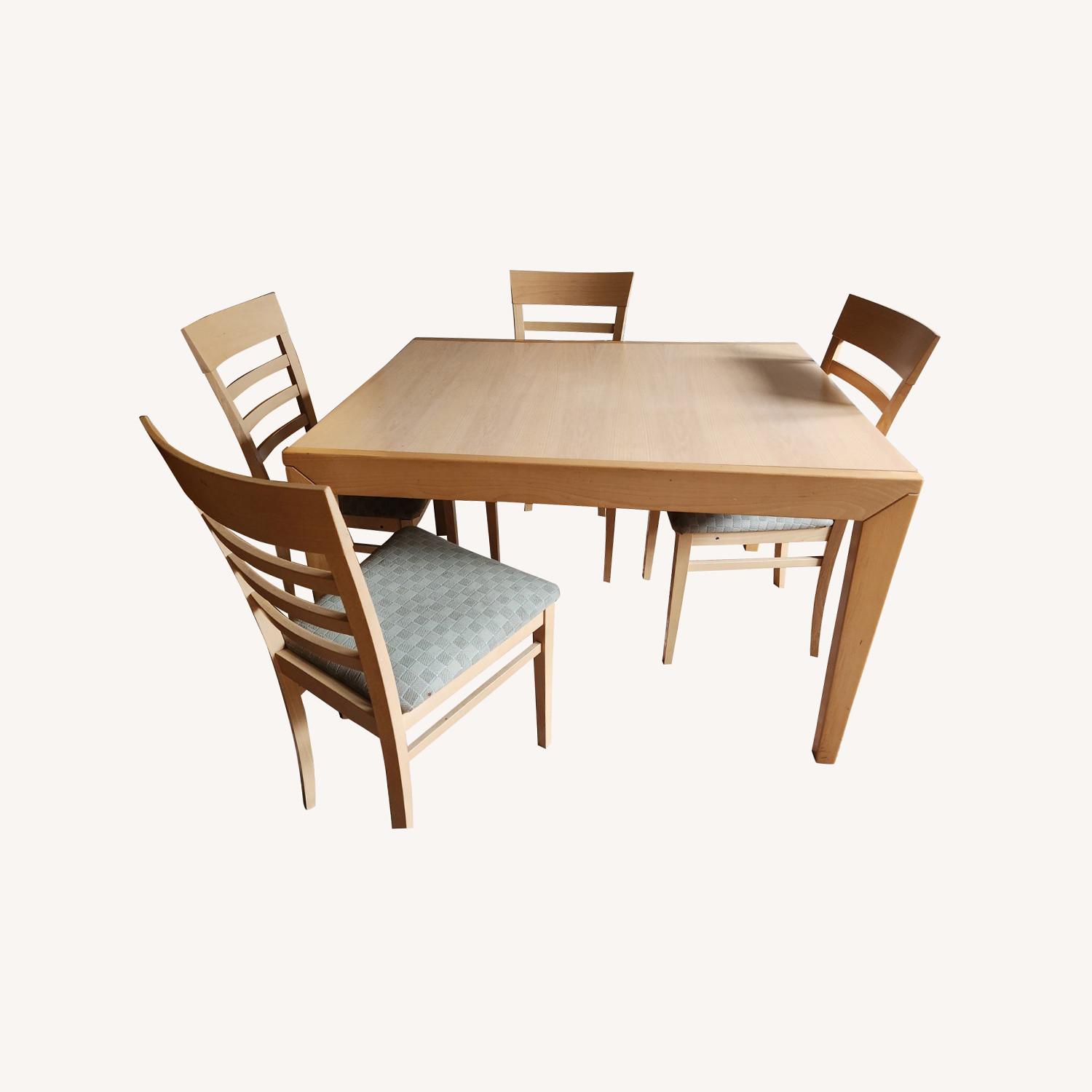 Elegant Innovative Dining Set AptDeco