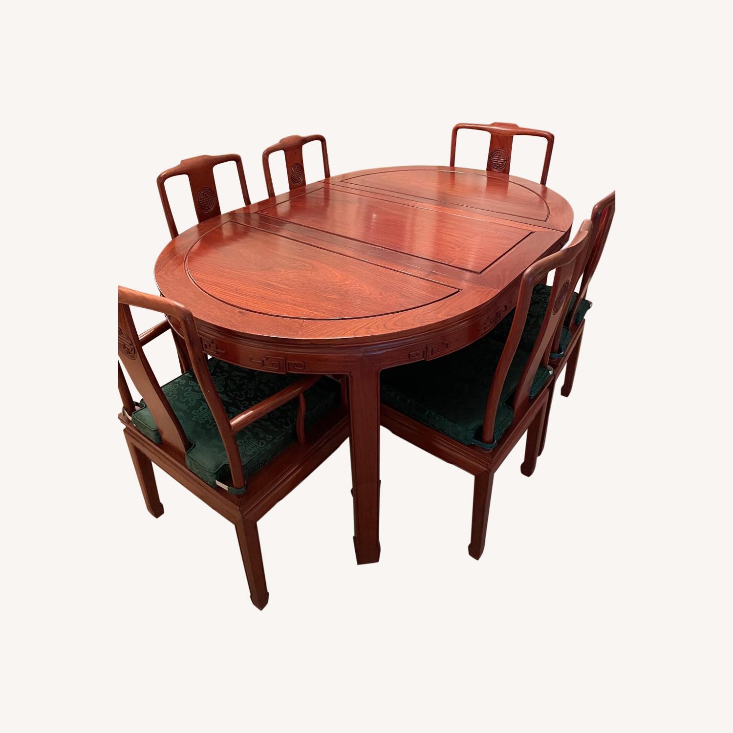 A Dining Table and Chairs Set - AptDeco