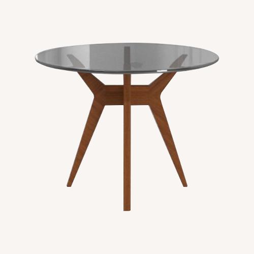 West Elm Glass Table with Dark Metal Base AptDeco