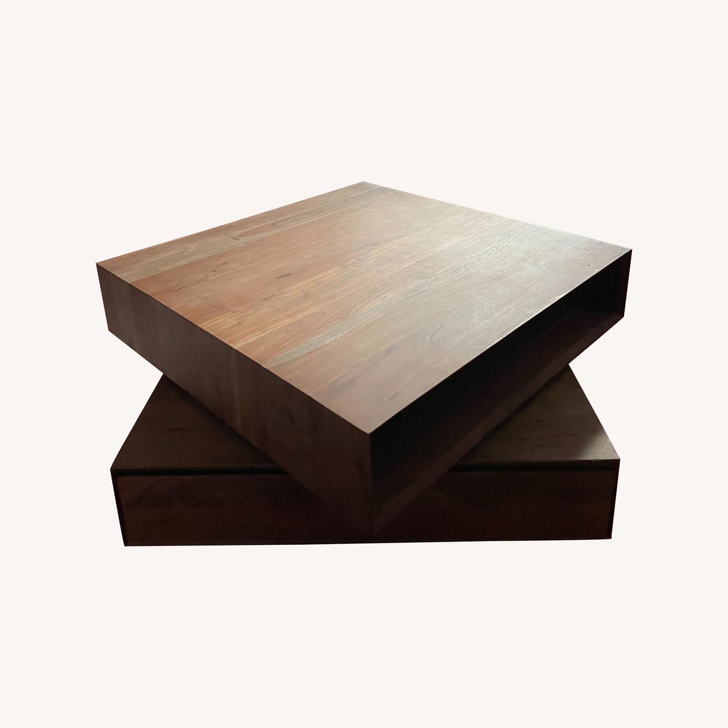 CB2 Rotating Coffee Table AptDeco