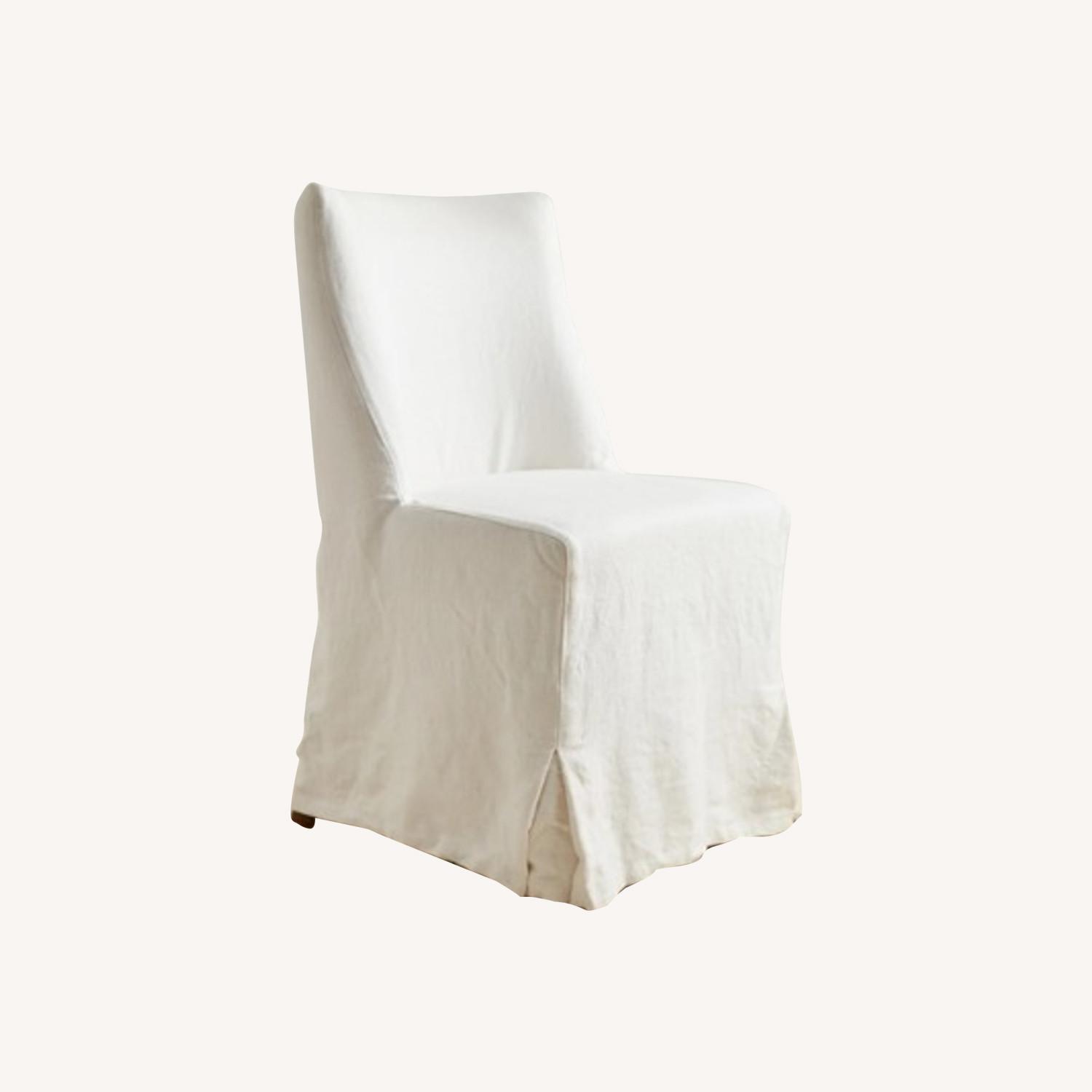 ABC Carpet and Home Pair Of White Linen Ghost Dining Chairs - image-0