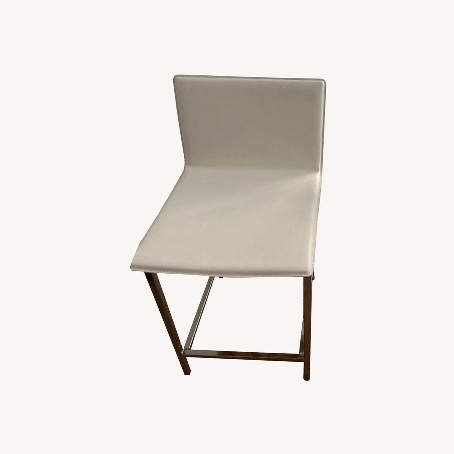 CB2 White Leather Stools 24 AptDeco