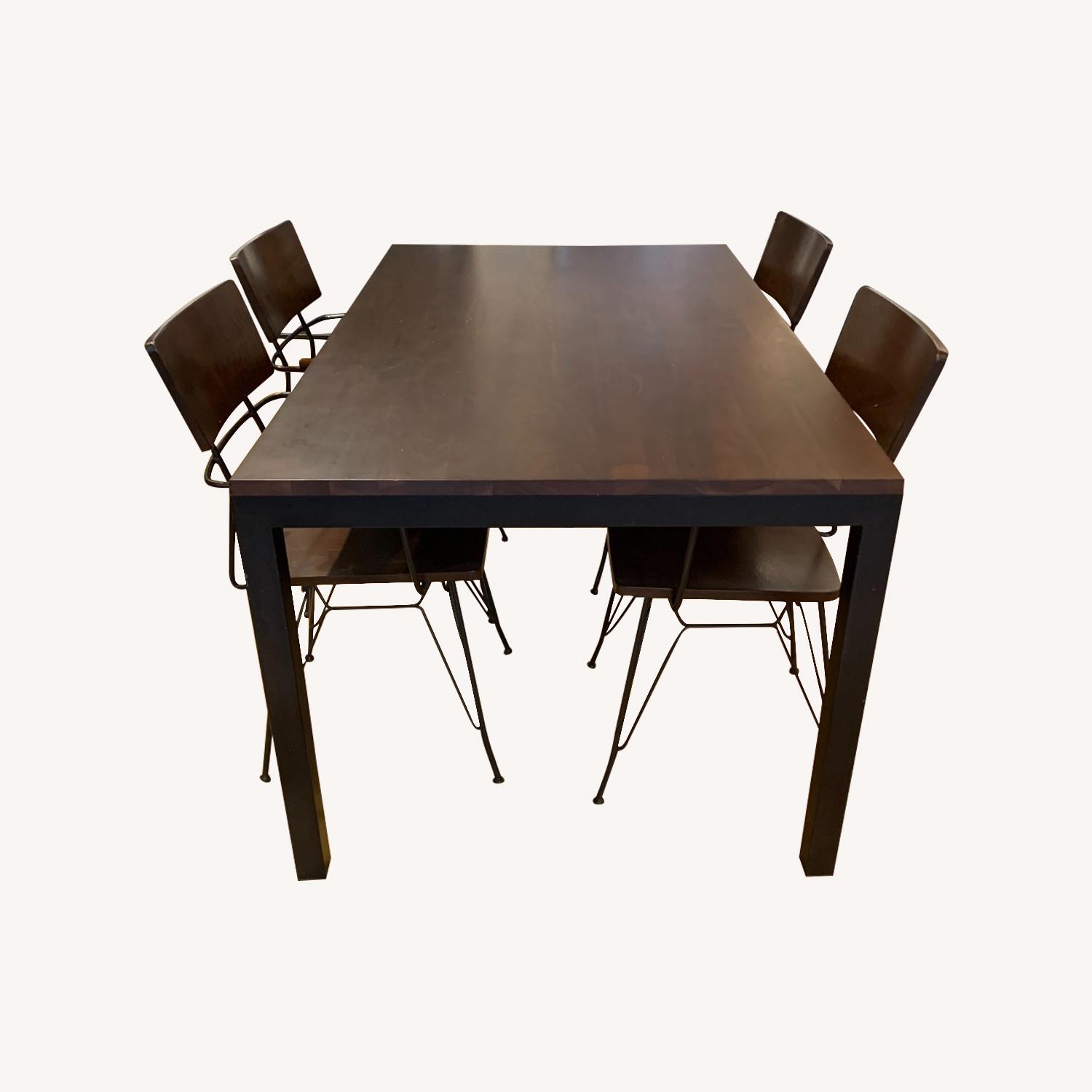 Crate & Barrel Walnut Dining Table + Arm Chairs AptDeco