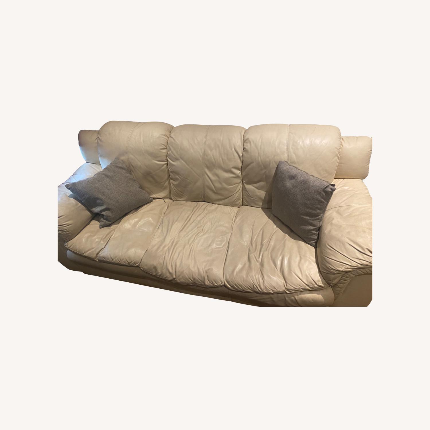 Beige Leather 3 person Couch AptDeco