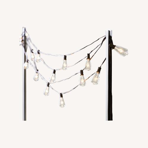 Pottery Barn Isabell Rattan Armchair AptDeco