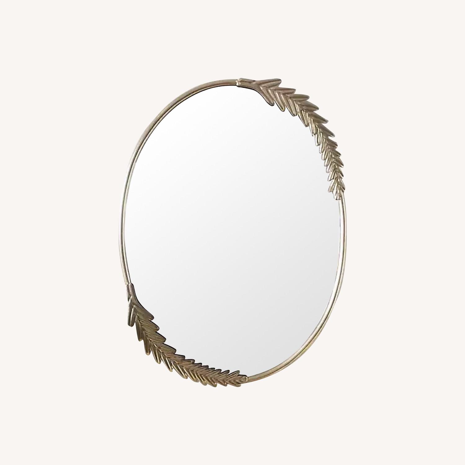 Kirkland's Gold Finish Oval Wreath Mirror AptDeco