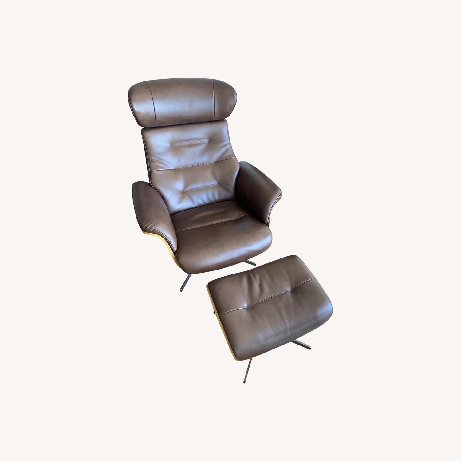Living Spaces Brown Leather Recliner with Ottoman - image-0