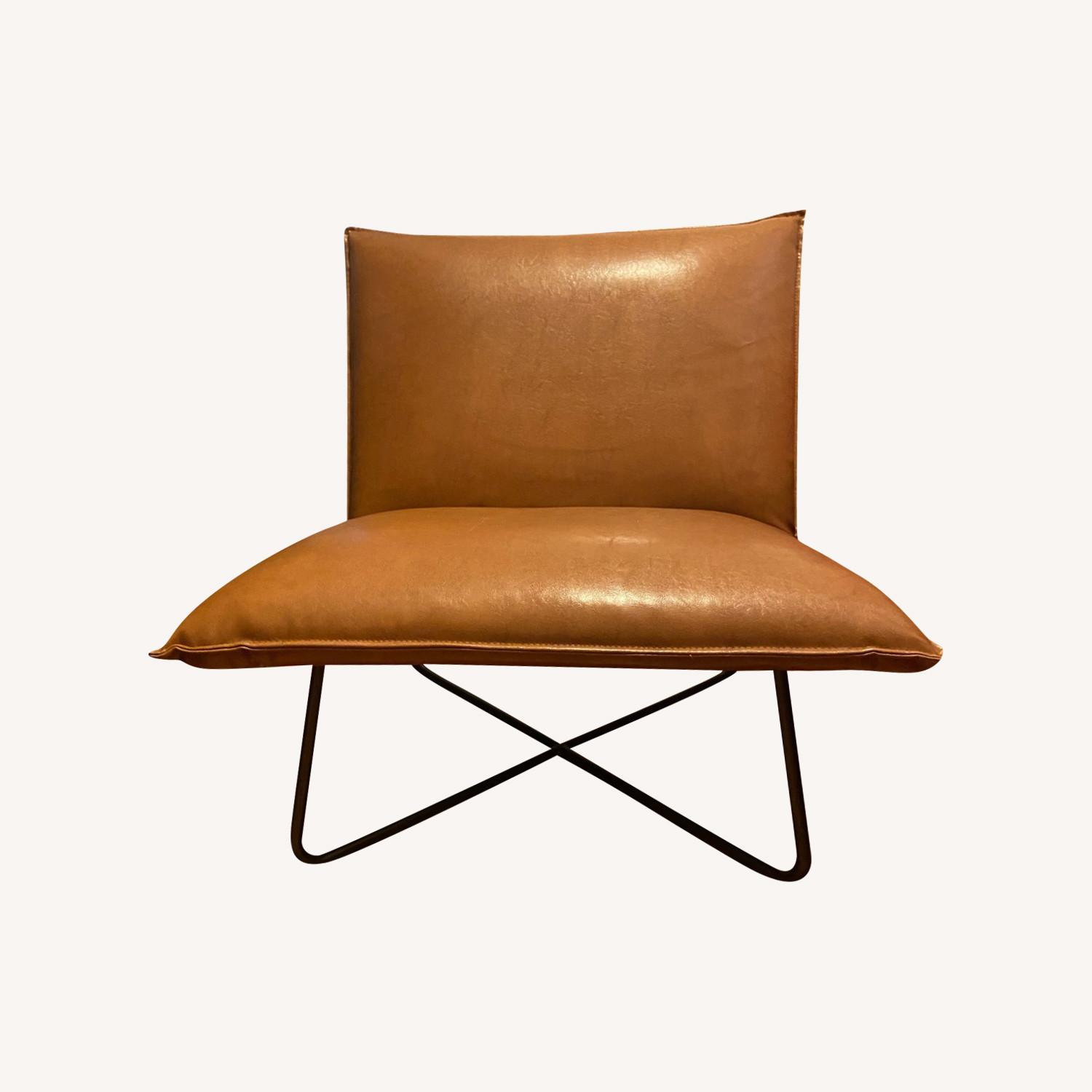 Light Brown Leather Armless Chair with Metal base AptDeco