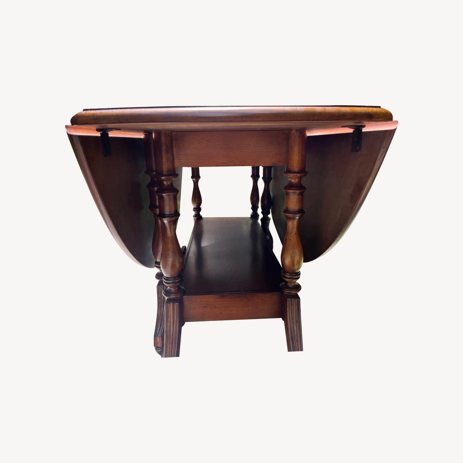 Hooker Vintage Dining Table with Folding Sides - image-0