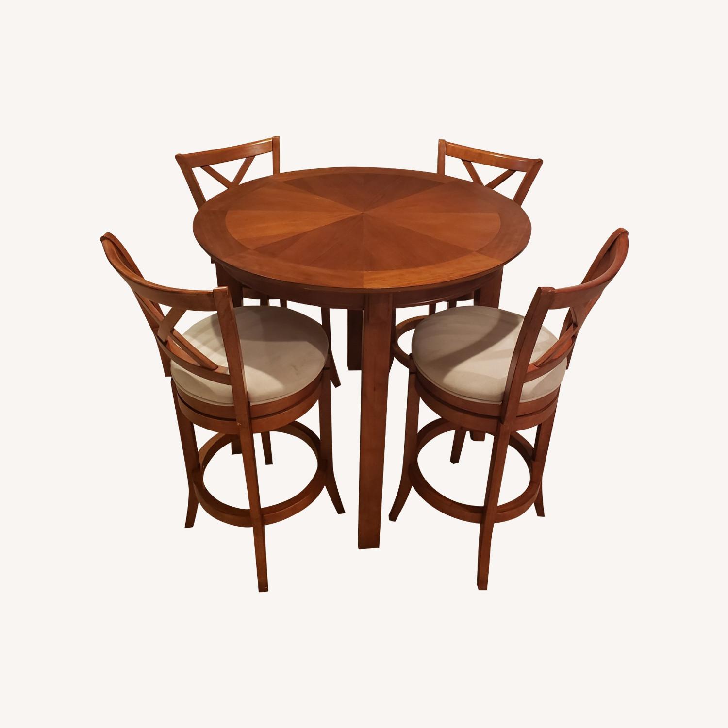 44' Dining Table With Four Swivel Bar Stools - image-0