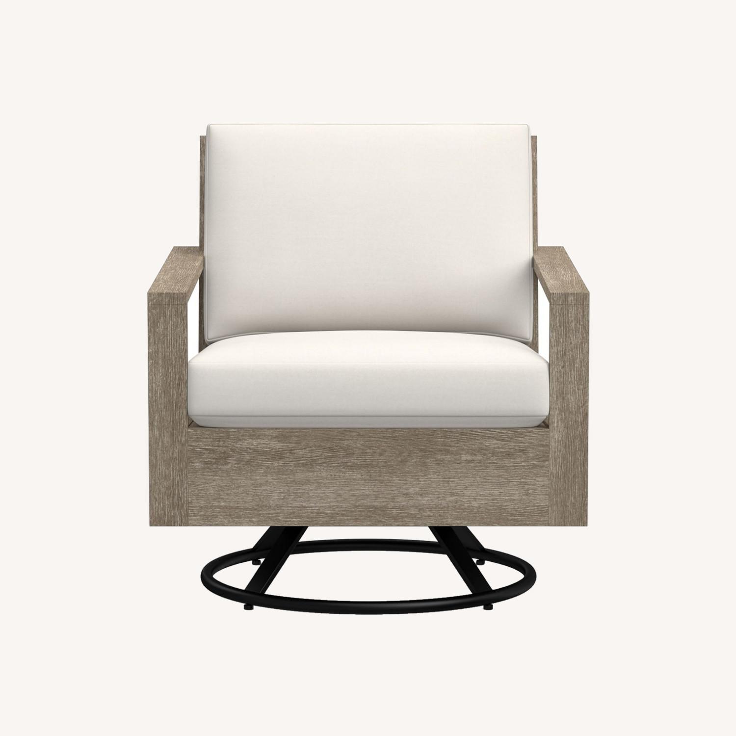 Pottery Barn Indio Wood Swivel Chair - image-0