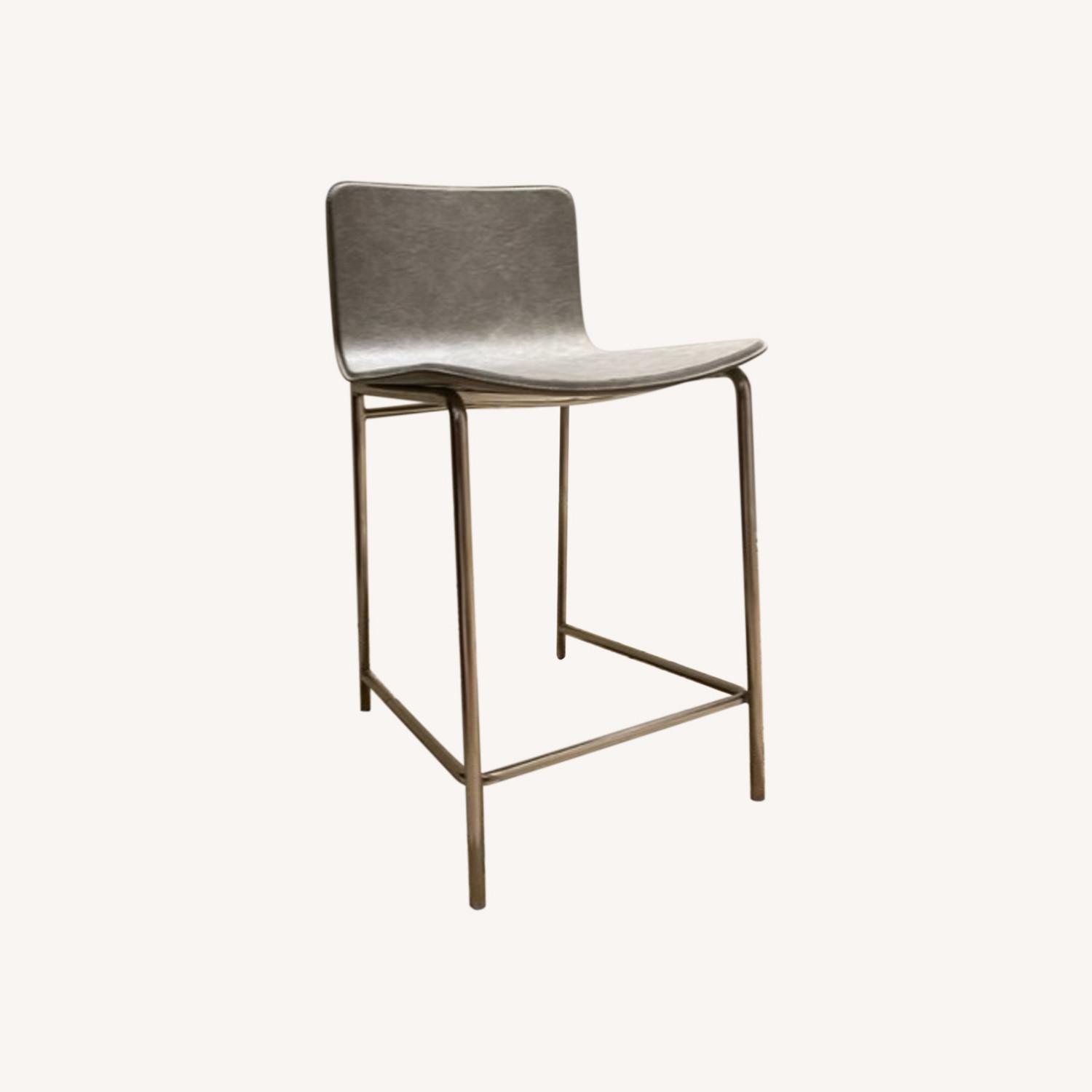 CB2 Light Grey Leather and Chrome Counter Stools AptDeco