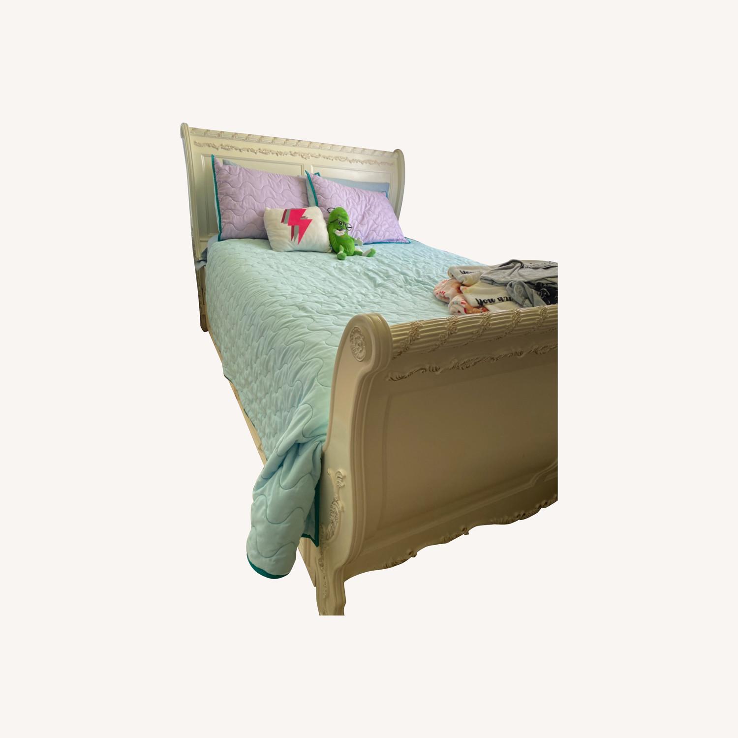 Full size Bed with Trundle Bed Underneath - image-0