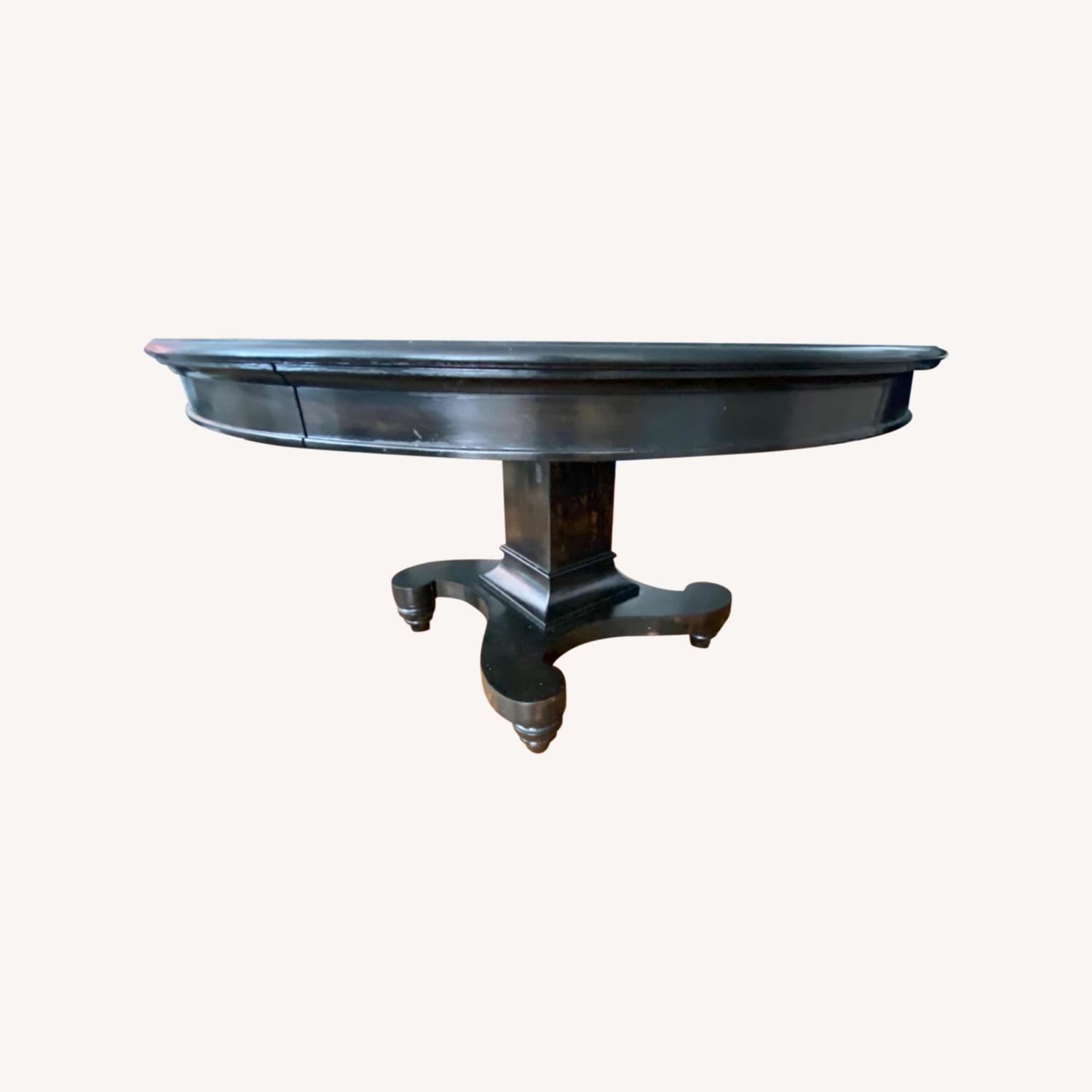 Contemporary Round Dark Wood Dining Table - AptDeco