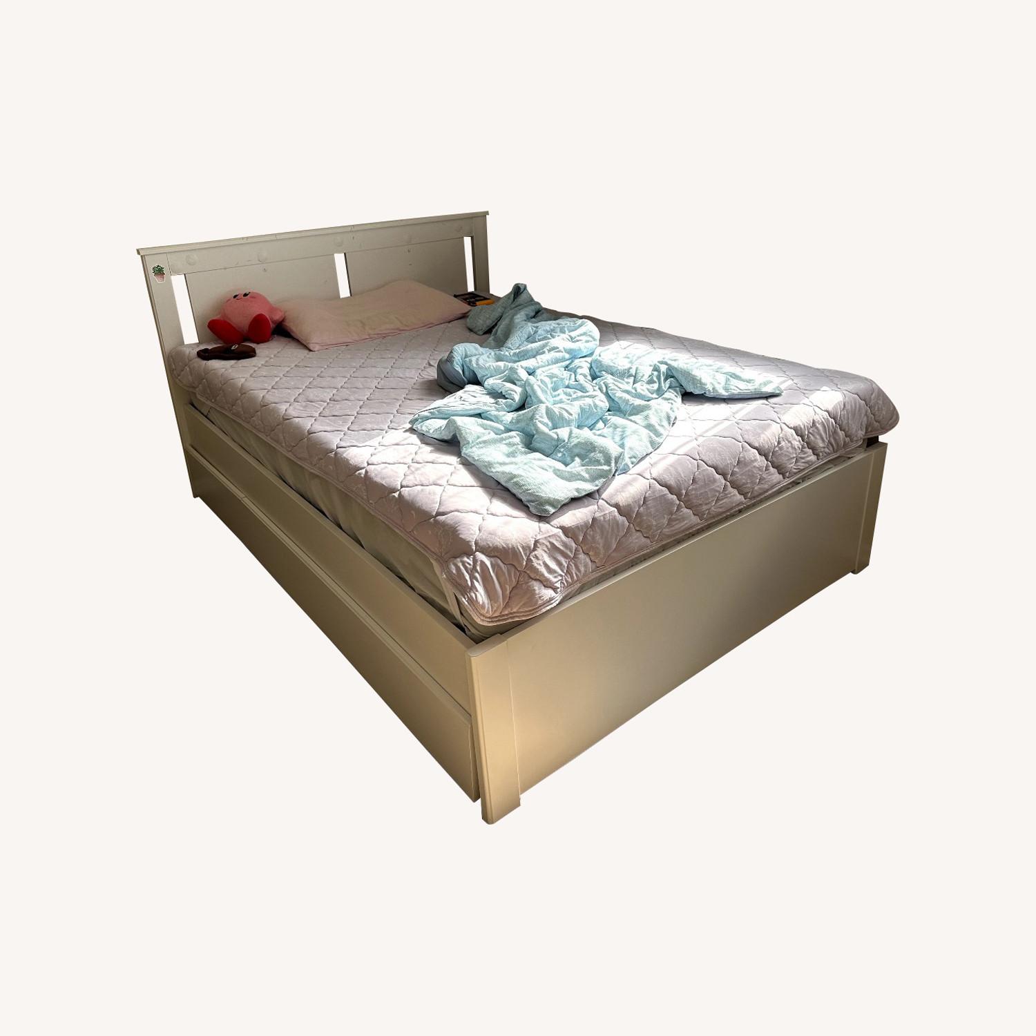 IKEA Full-size Bed Frame with Two Storage Drawers - image-0