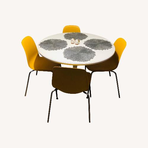 IKEA Square wooden table with 4 matching metal chairs - AptDeco