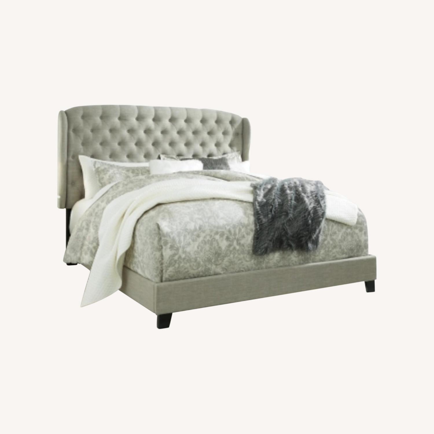 Ashley Furniture Queen Bed with Tufted Headboard - image-0