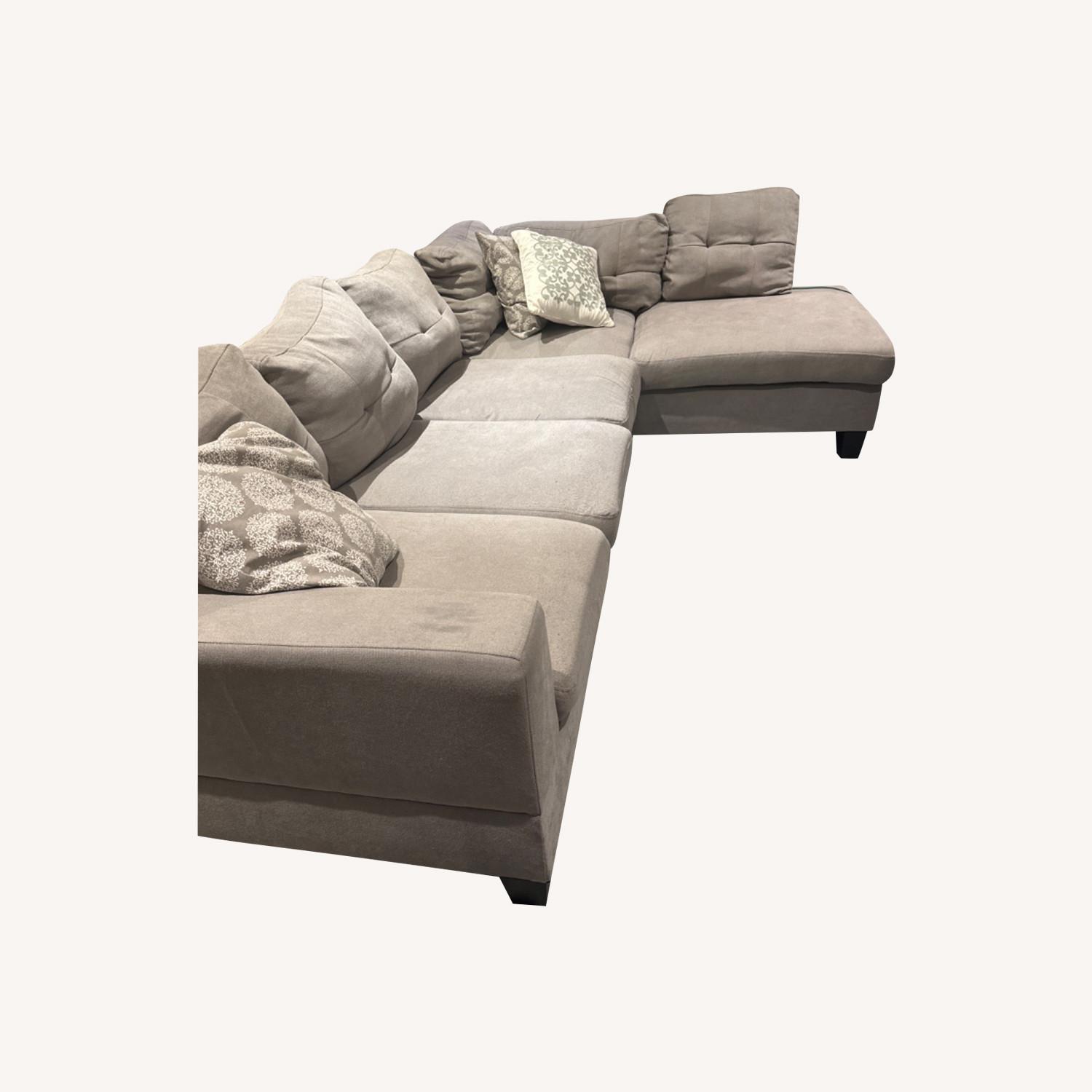 L-Shaped Gray Sectional Sofa (includes pillows) - image-0