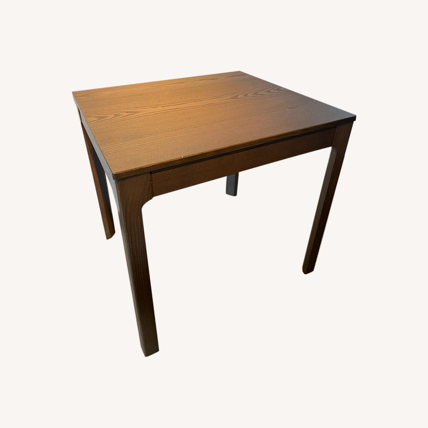 IKEA Dark Brown Wood Extendable Dining Table AptDeco