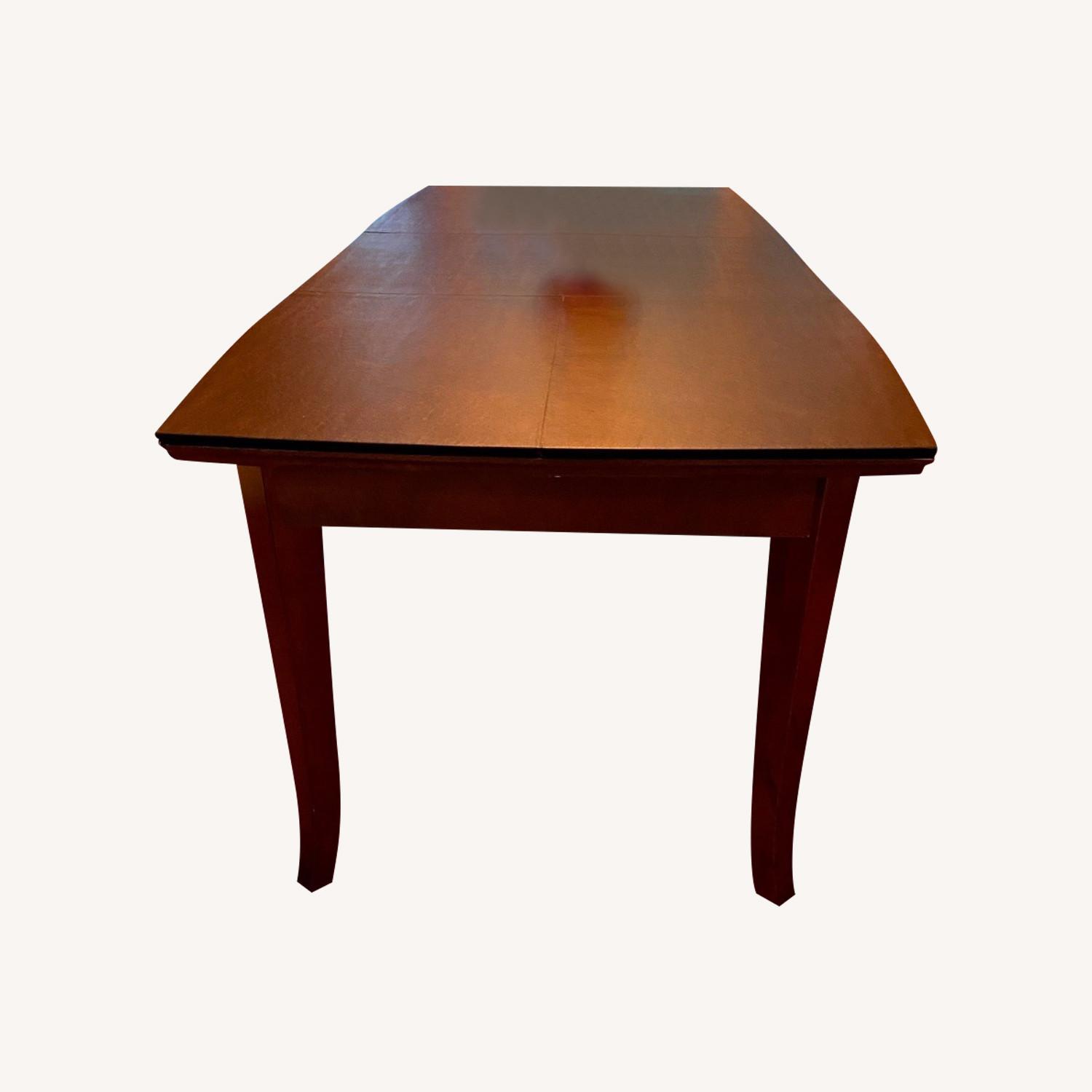 Extendable Dining Room Table with Leaf & Pads AptDeco