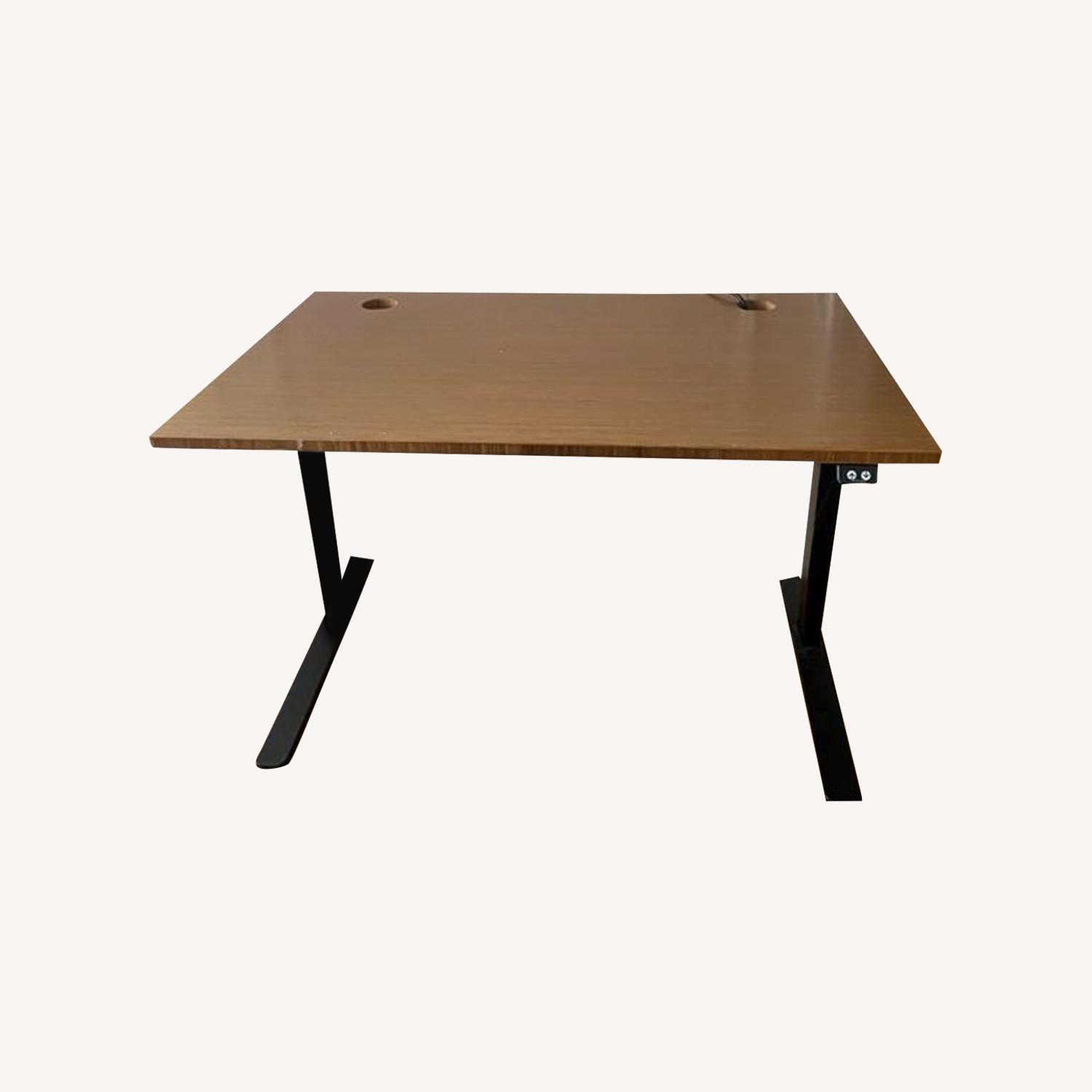 UPLIFT Standing Desk with Power Strip AptDeco