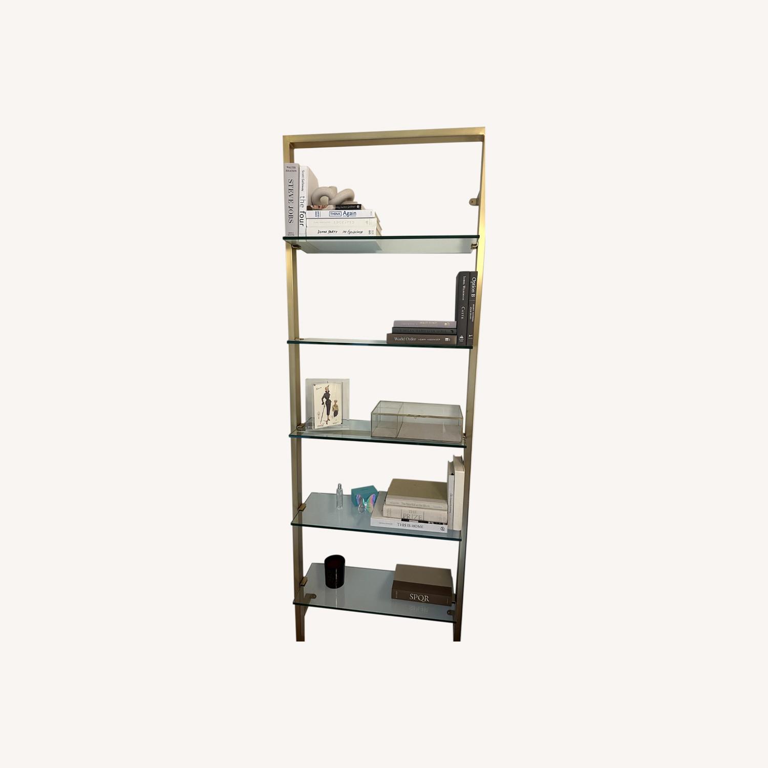 CB2 Brass Metal Wall Mount Bookshelf AptDeco