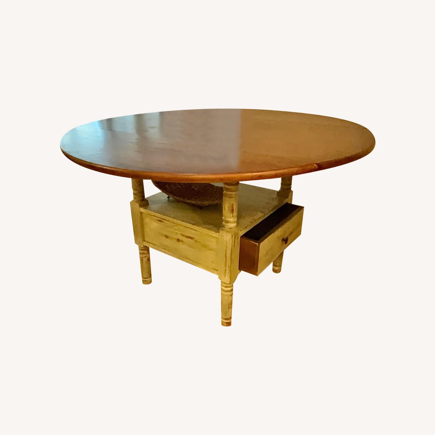 Crate & Barrel Round Dining Table With Folding Leaves AptDeco