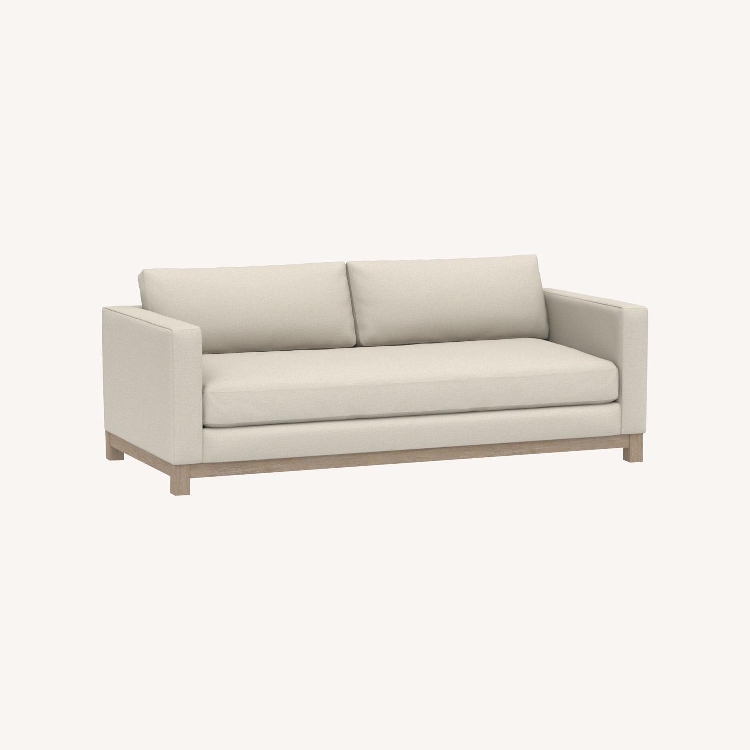Pottery Barn Jake Upholstered Sofa with Wood Base AptDeco